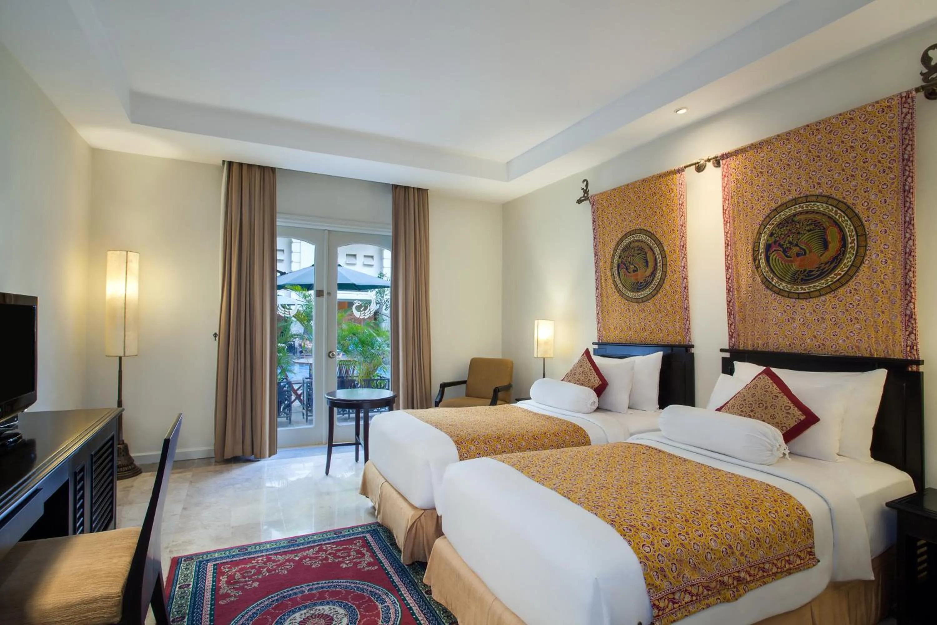 Bed in The Phoenix Hotel Yogyakarta - Handwritten Collection