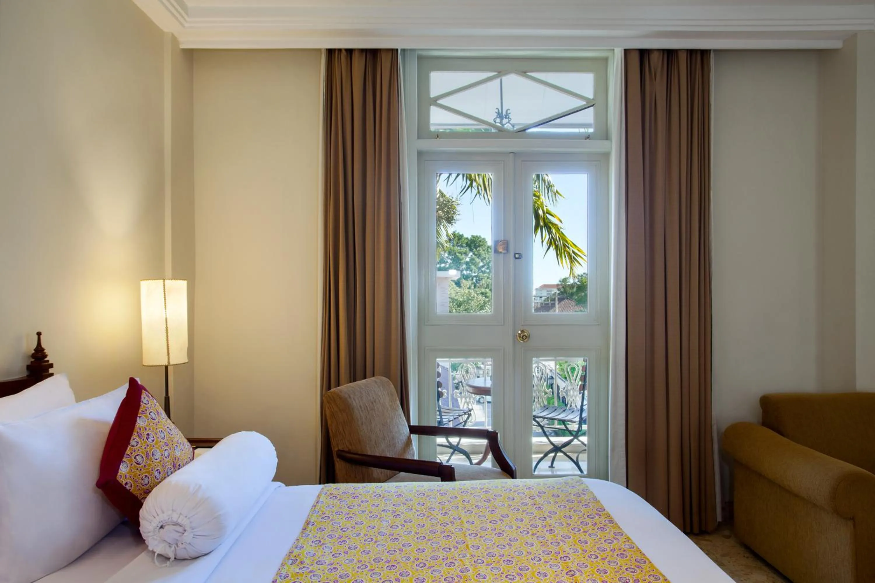 Bed in The Phoenix Hotel Yogyakarta - Handwritten Collection