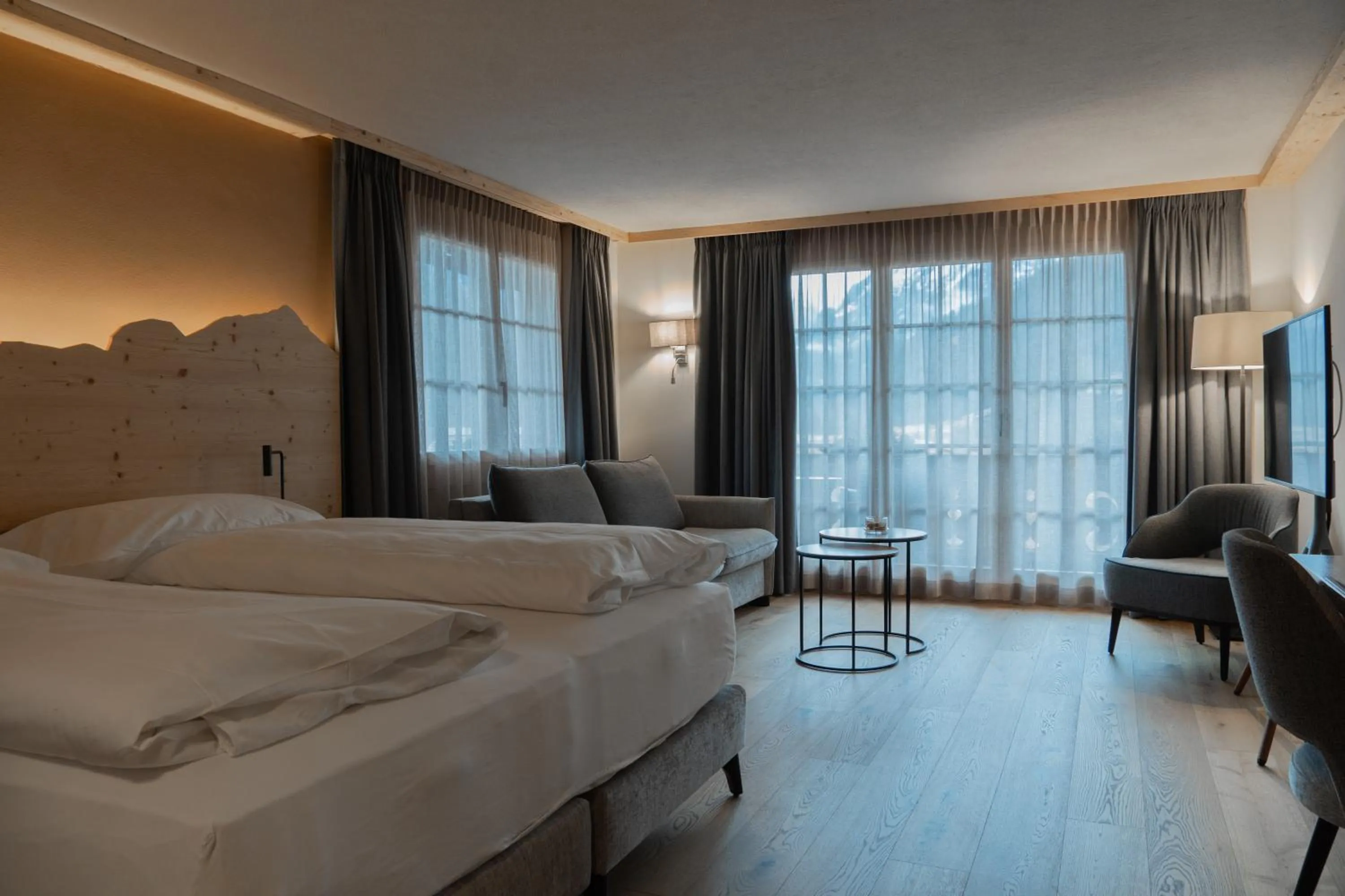 Bed in Hotel Alpenland