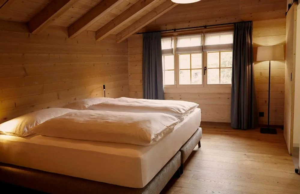 Bed in Hotel Alpenland