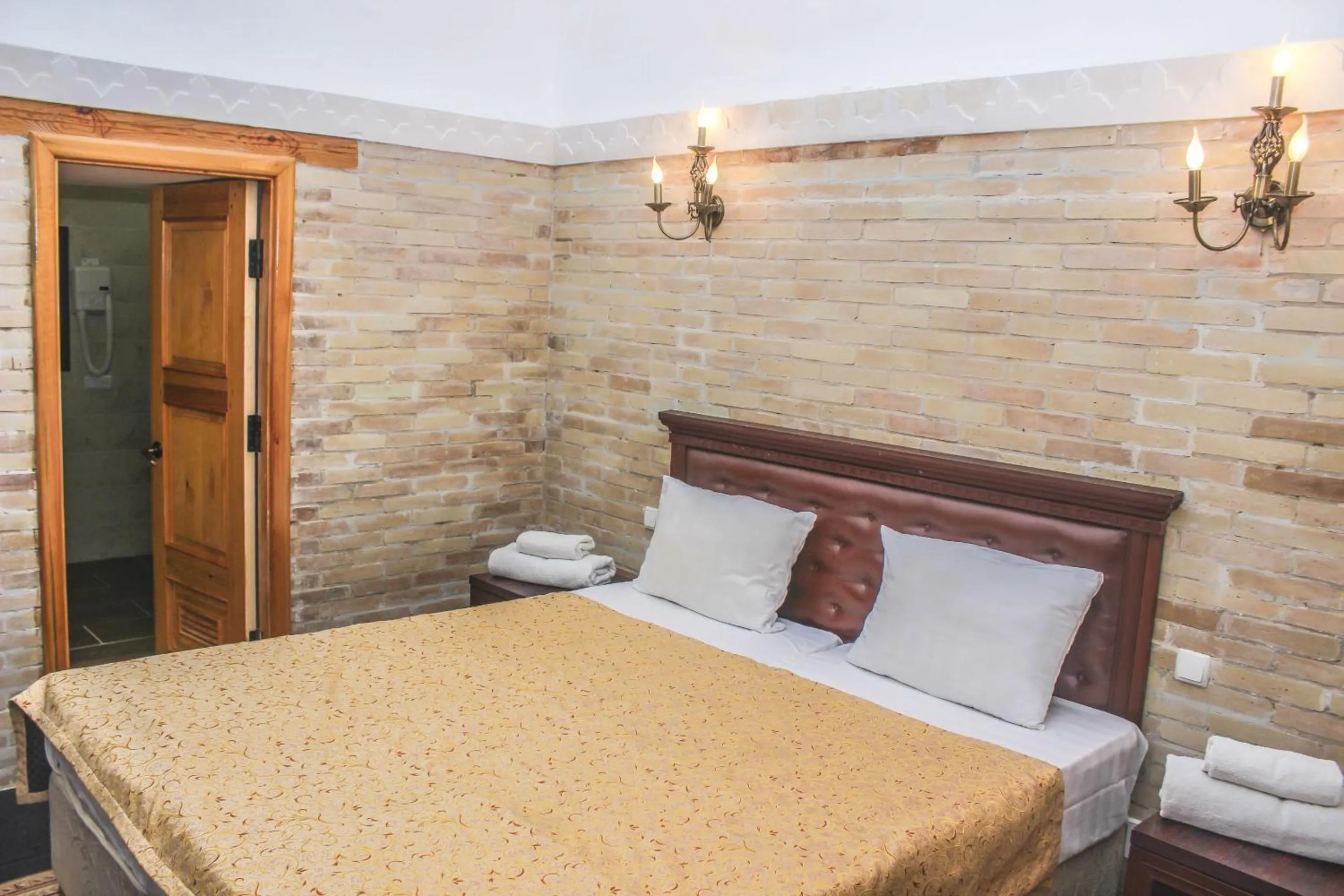 Bed in Orient Star Khiva Hotel- Madrasah Muhammad Aminkhan 1855