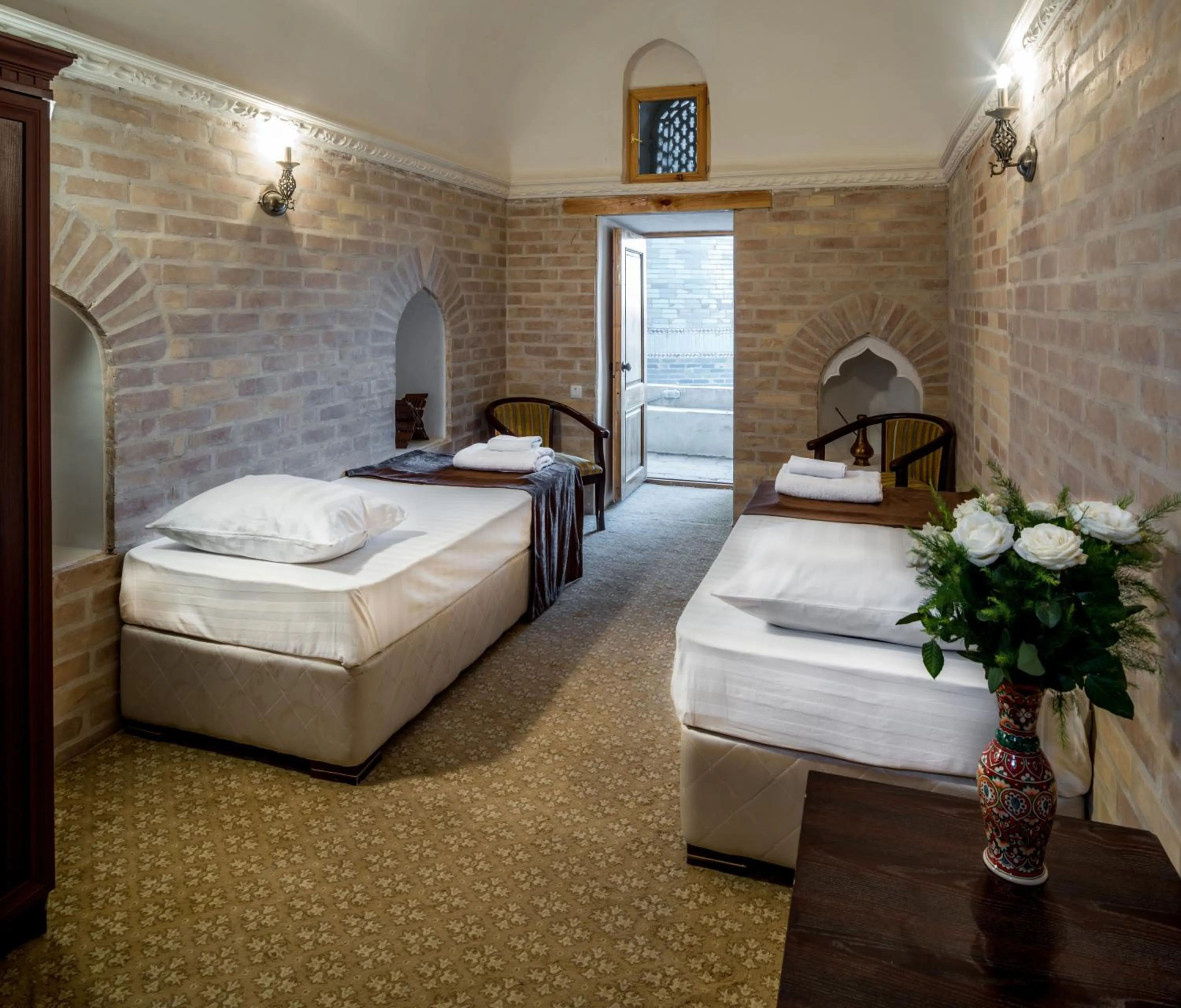 Bed in Orient Star Khiva Hotel- Madrasah Muhammad Aminkhan 1855