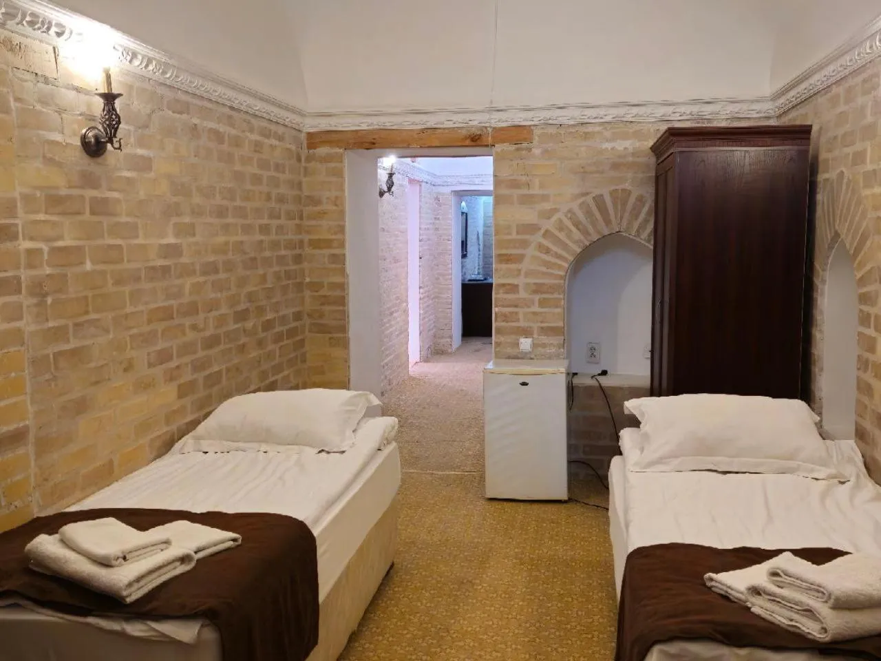 Bed in Orient Star Khiva Hotel- Madrasah Muhammad Aminkhan 1855