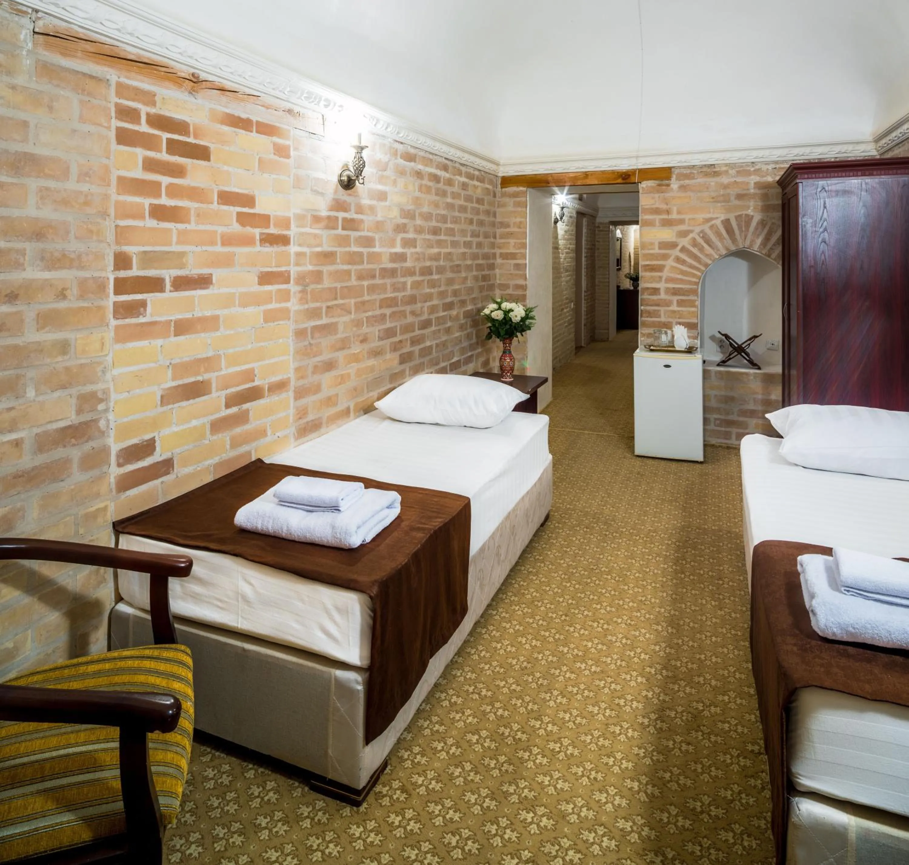 Bed in Orient Star Khiva Hotel- Madrasah Muhammad Aminkhan 1855