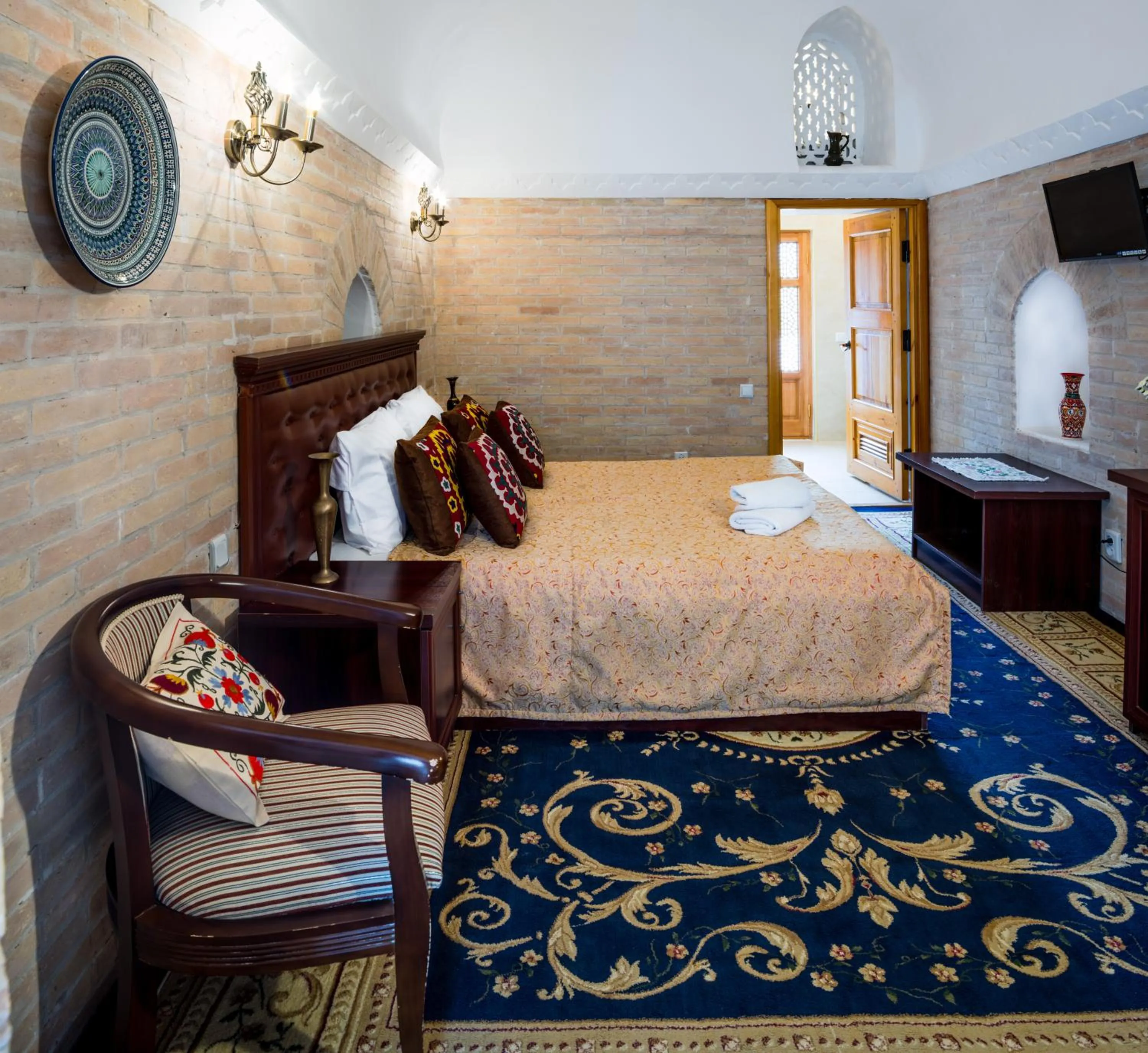 Bed in Orient Star Khiva Hotel- Madrasah Muhammad Aminkhan 1855