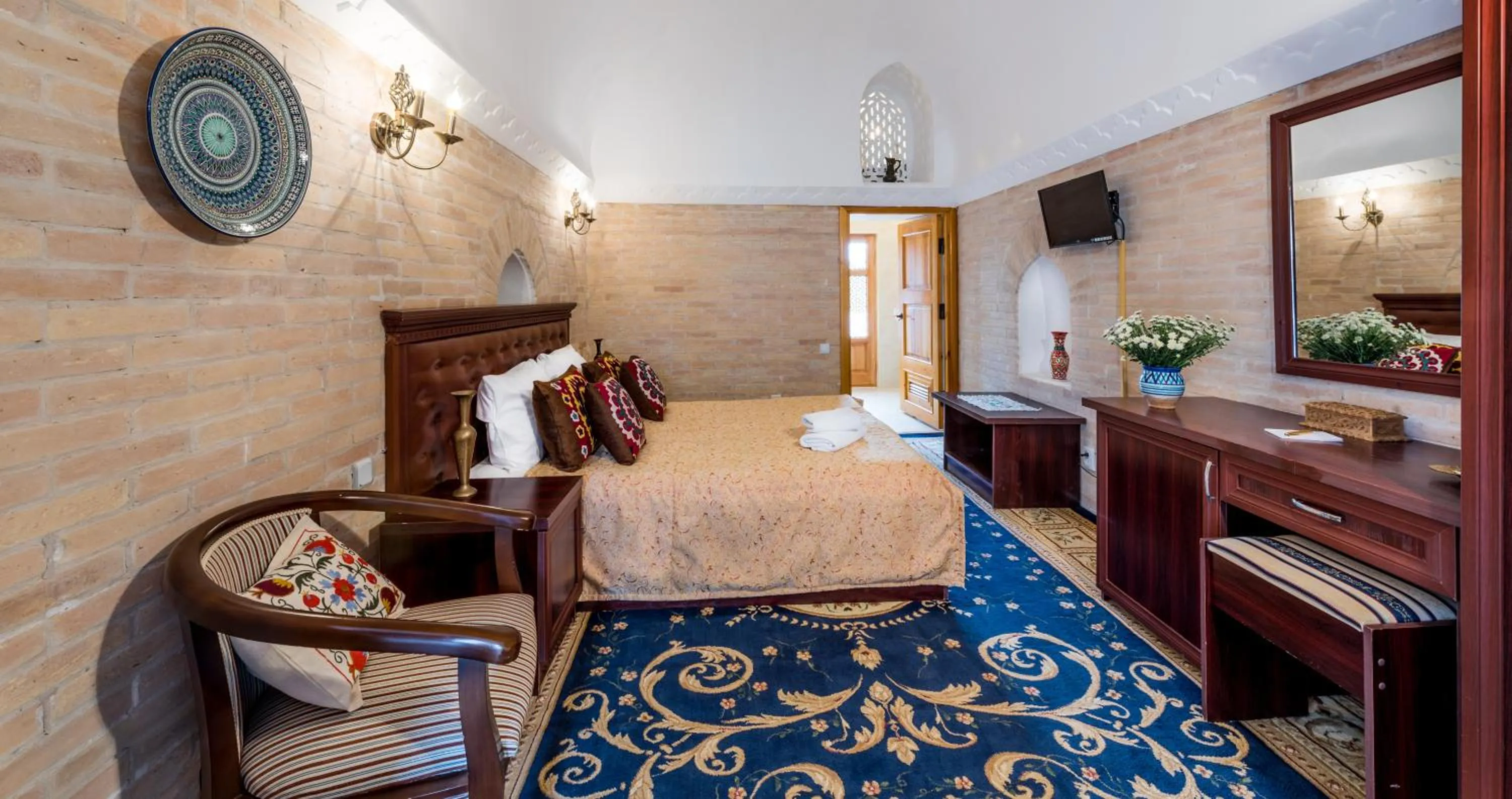 Bed in Orient Star Khiva Hotel- Madrasah Muhammad Aminkhan 1855