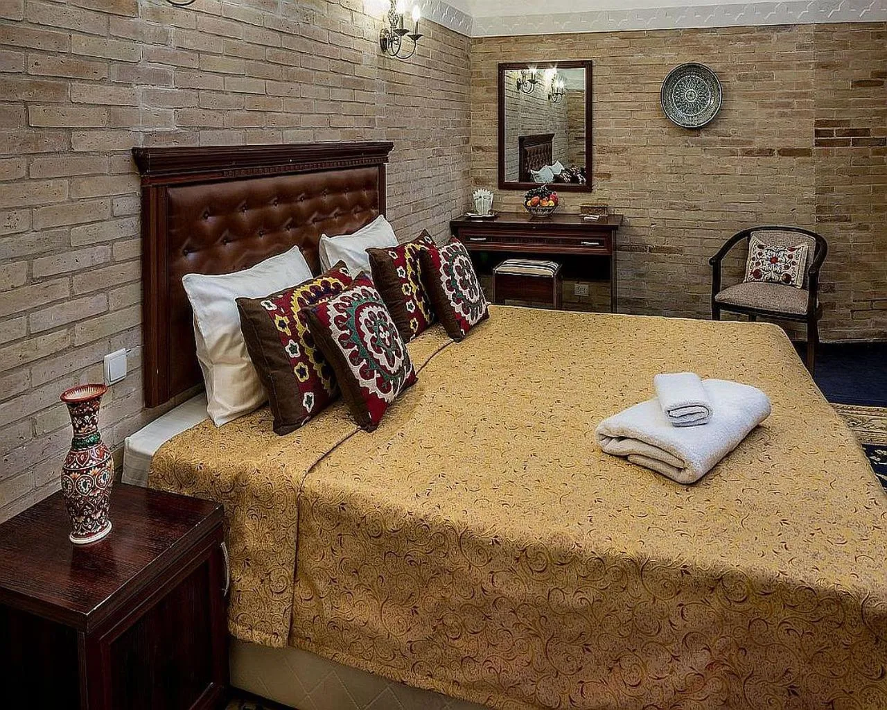 Bed in Orient Star Khiva Hotel- Madrasah Muhammad Aminkhan 1855