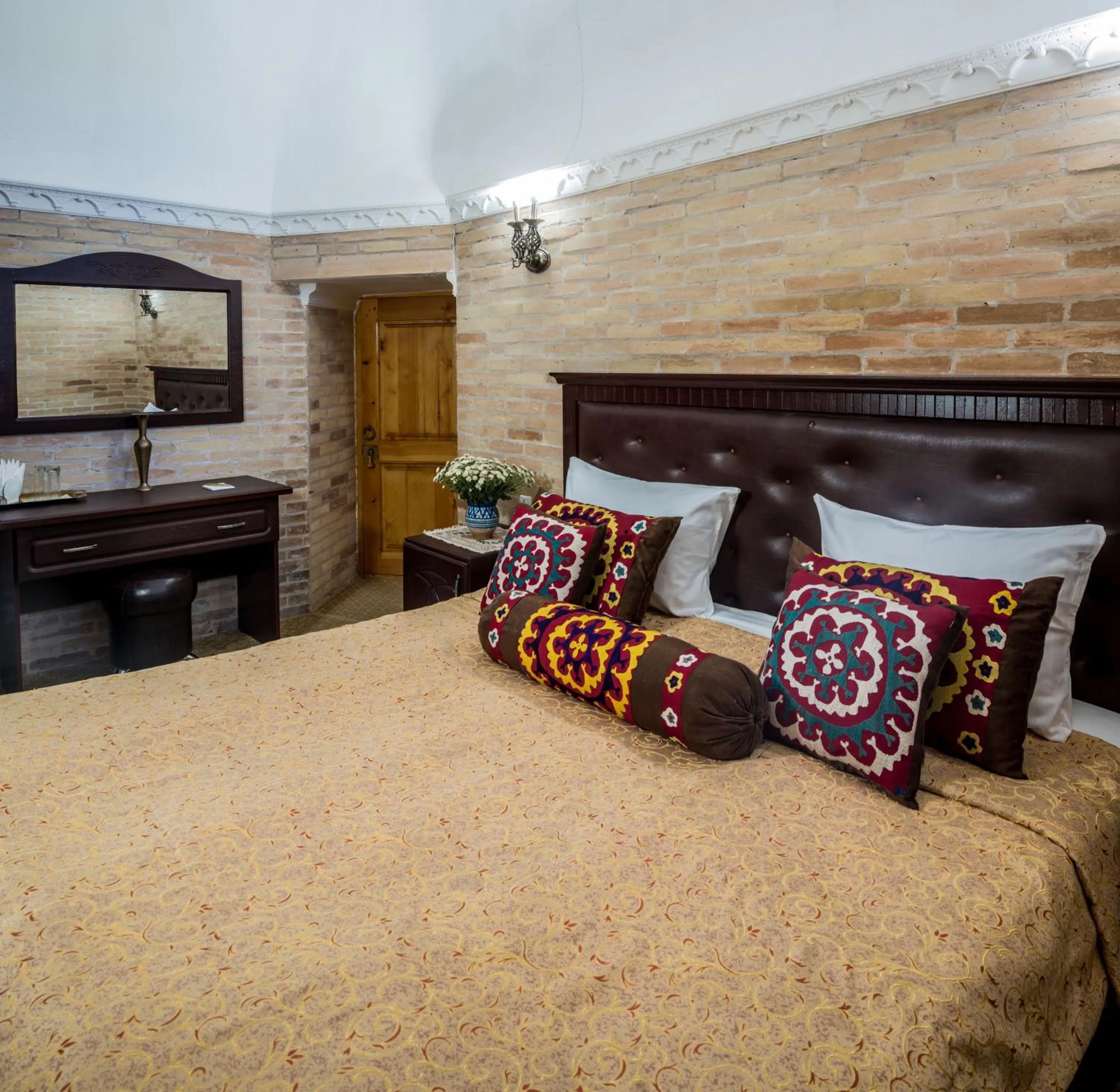 Bed in Orient Star Khiva Hotel- Madrasah Muhammad Aminkhan 1855