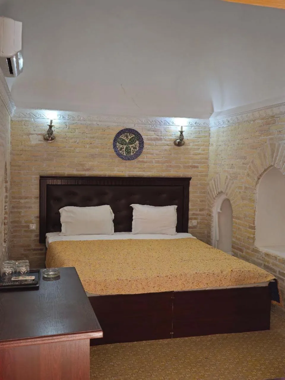 Bed in Orient Star Khiva Hotel- Madrasah Muhammad Aminkhan 1855