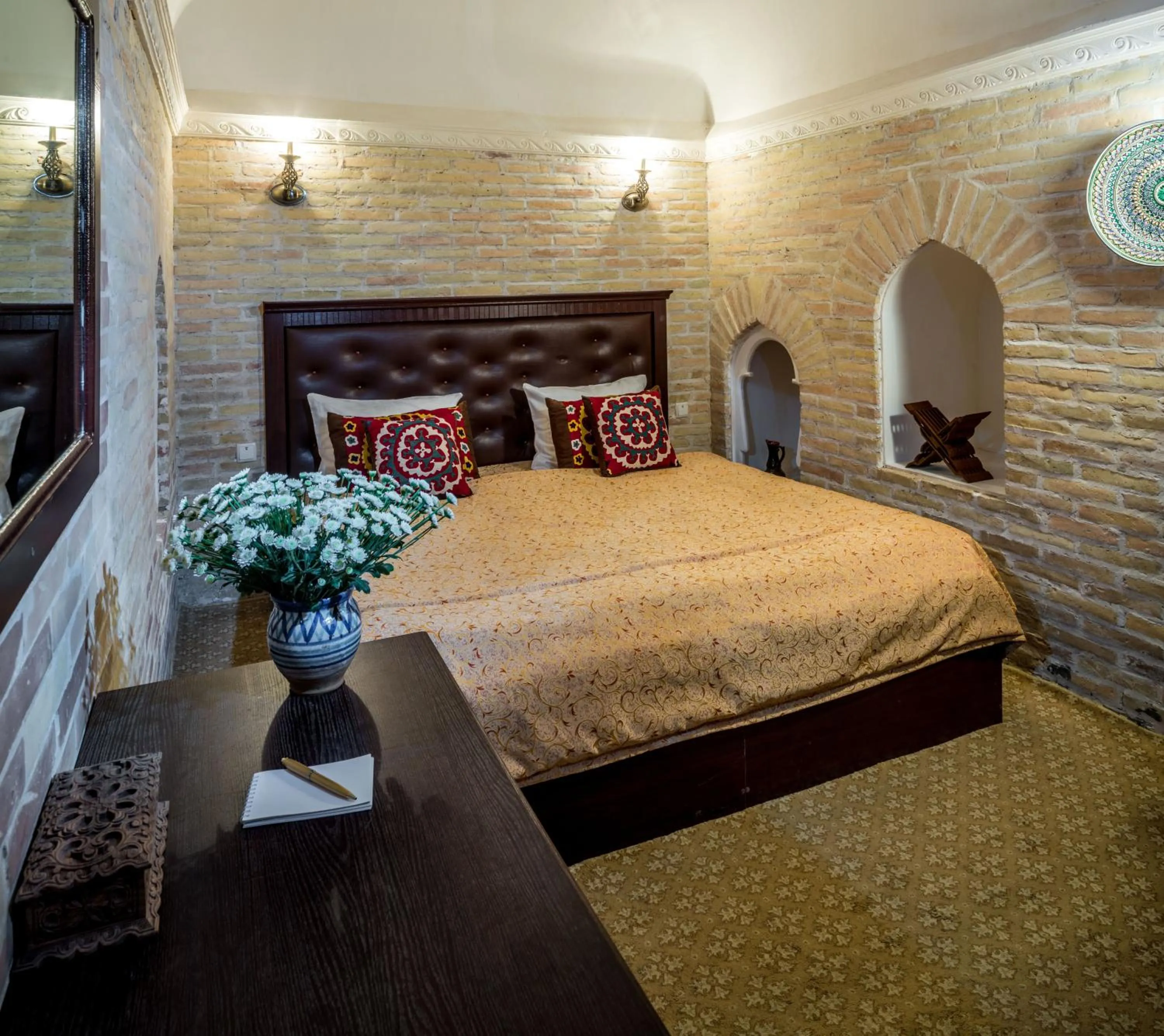 Bed in Orient Star Khiva Hotel- Madrasah Muhammad Aminkhan 1855