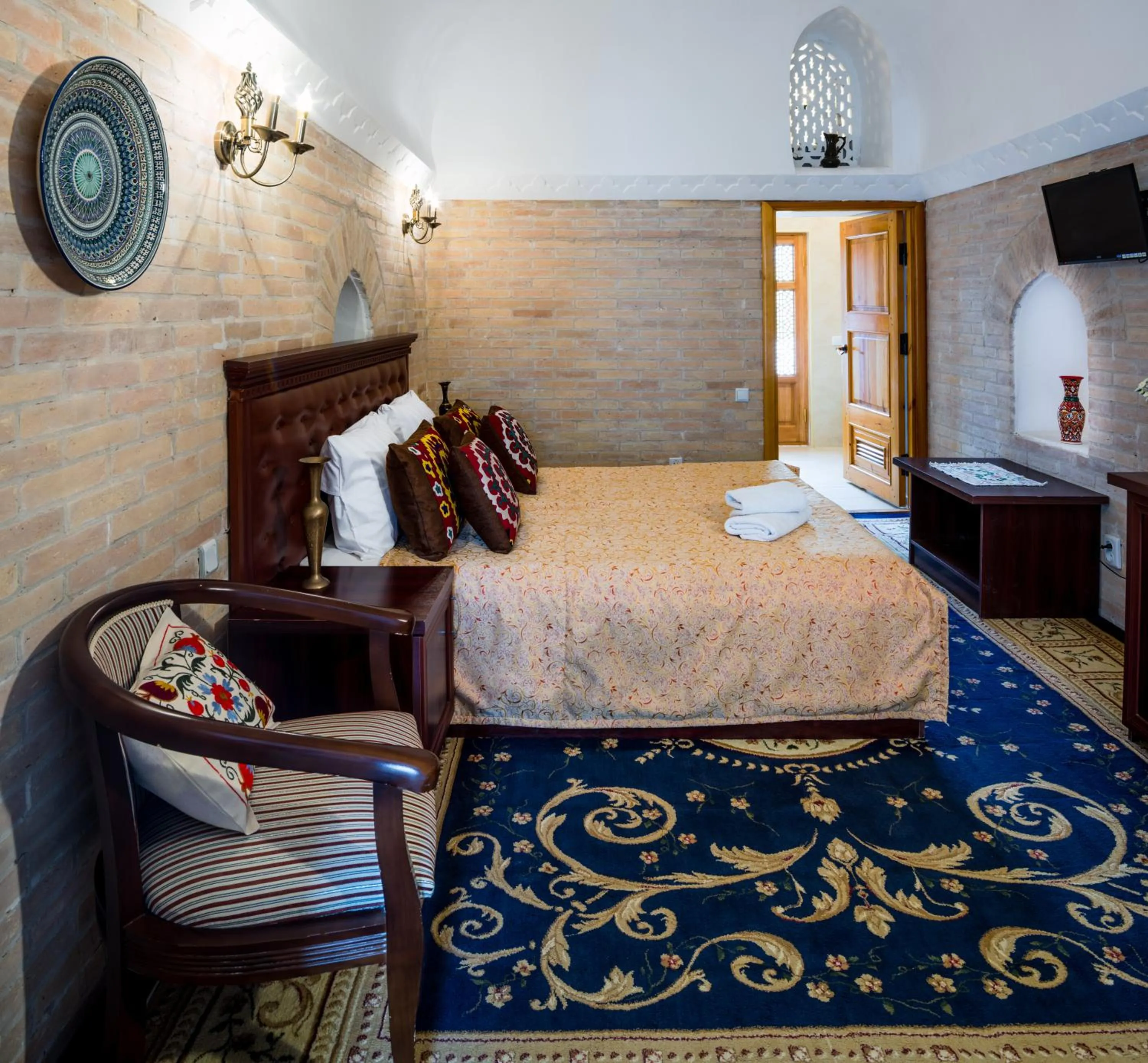 Bed in Orient Star Khiva Hotel- Madrasah Muhammad Aminkhan 1855