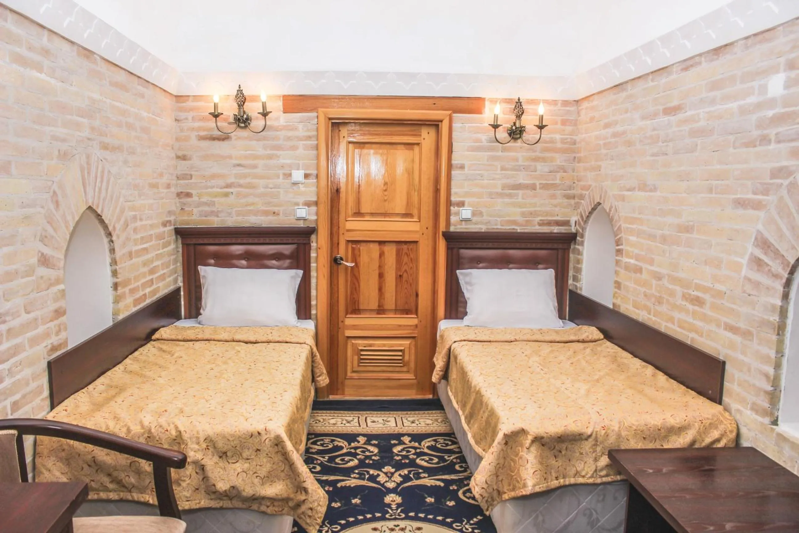 Bed in Orient Star Khiva Hotel- Madrasah Muhammad Aminkhan 1855