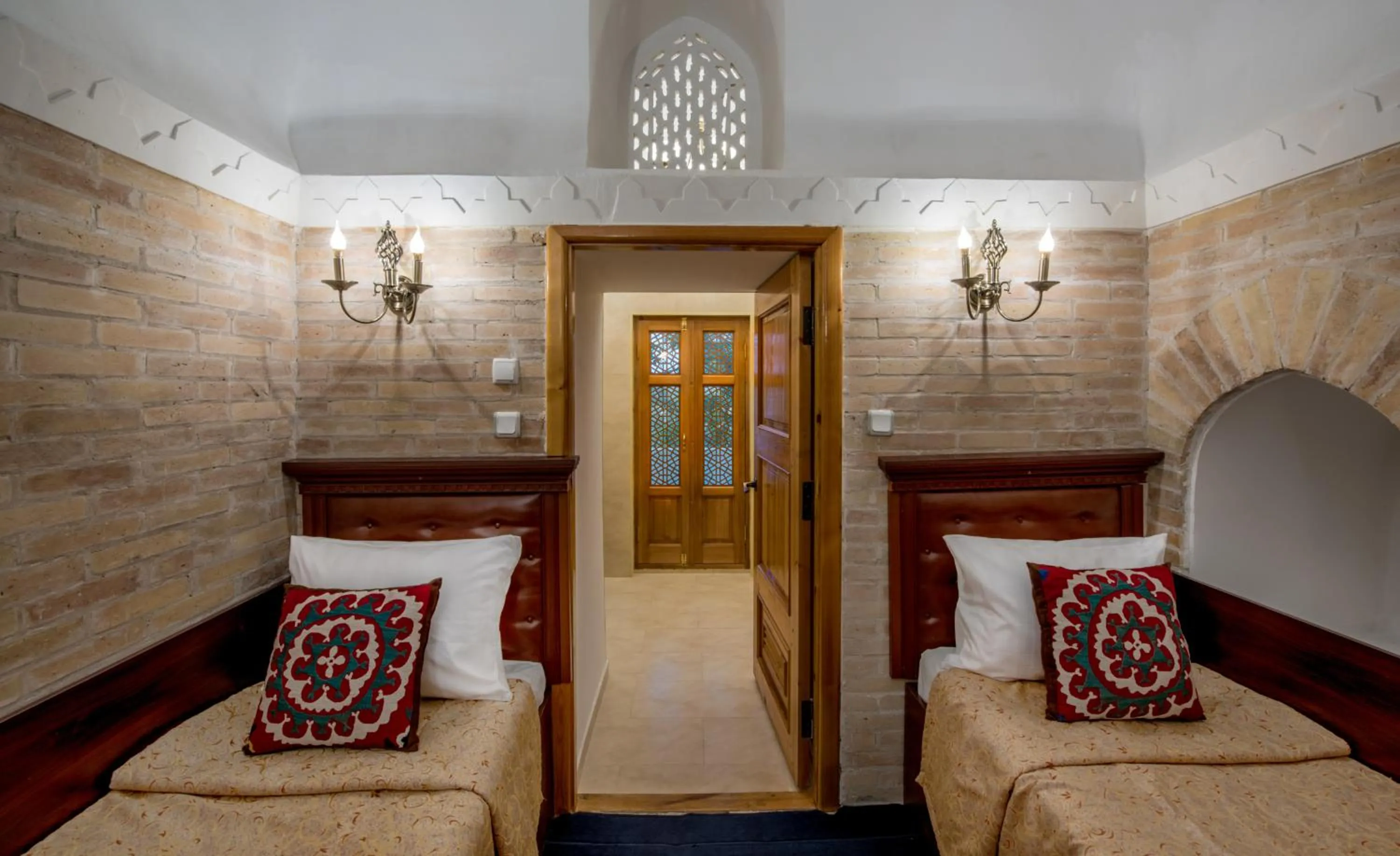 Bed in Orient Star Khiva Hotel- Madrasah Muhammad Aminkhan 1855