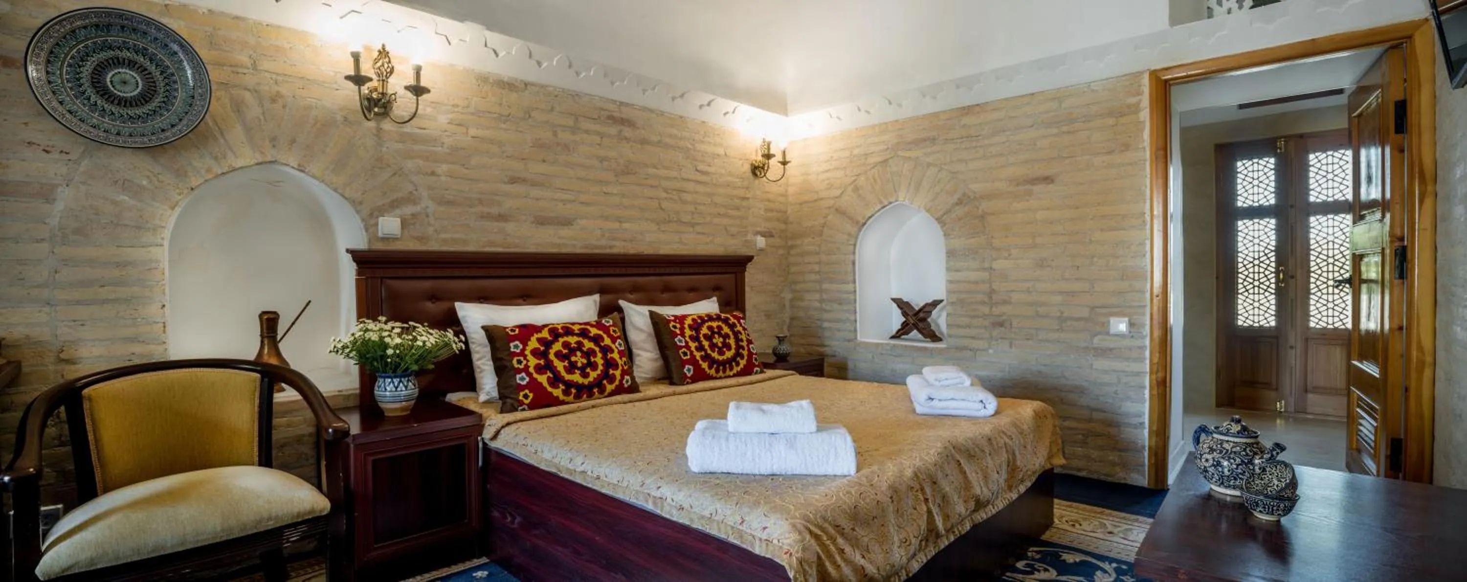 Bed in Orient Star Khiva Hotel- Madrasah Muhammad Aminkhan 1855