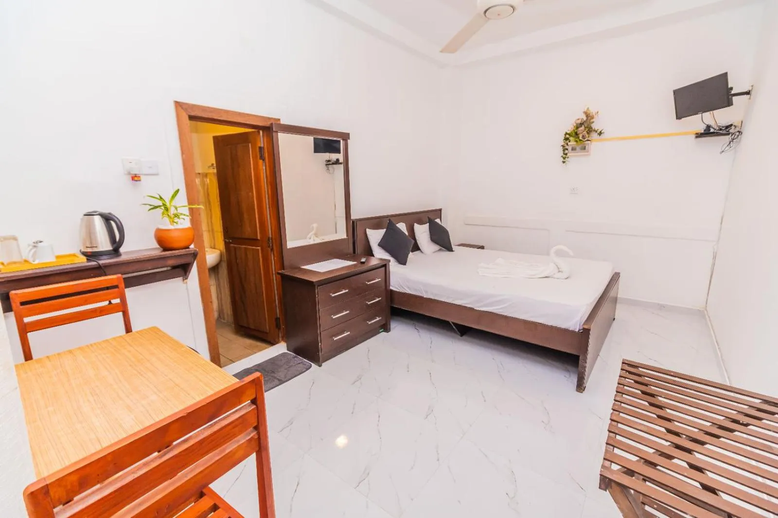 Bed in Cinnamon Airport Residencies