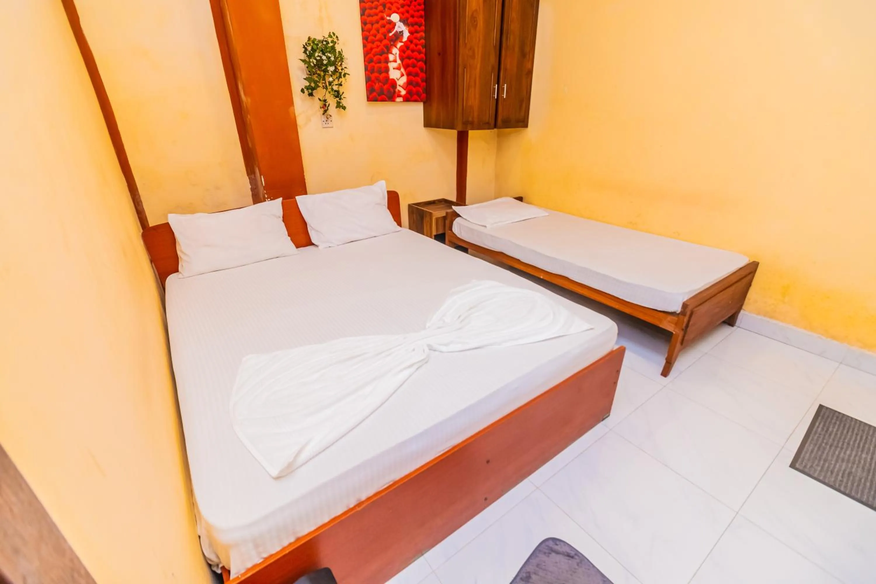 Bed in Cinnamon Airport Residencies