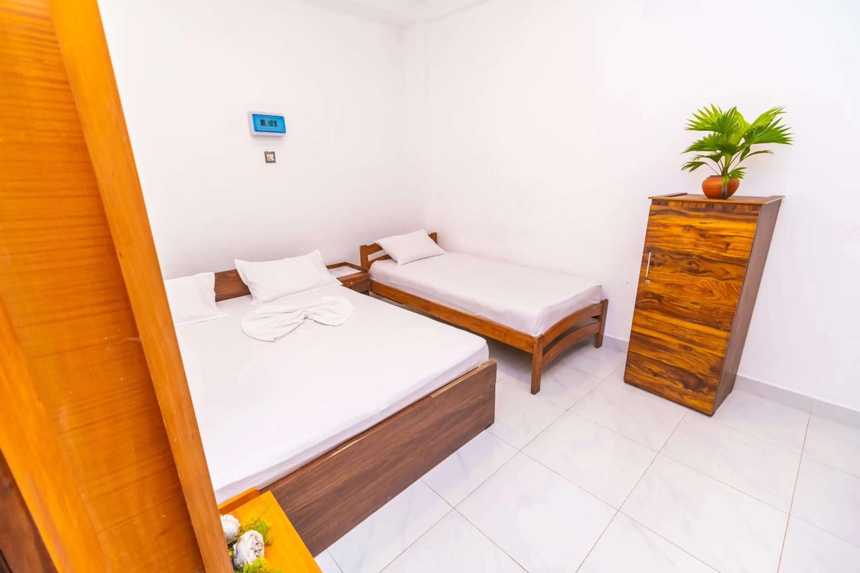 Bed in Cinnamon Airport Residencies