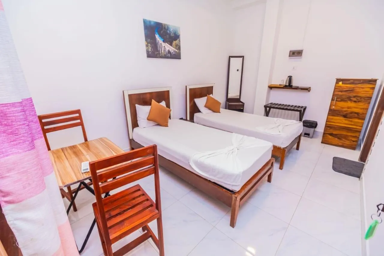 Bed in Cinnamon Airport Residencies