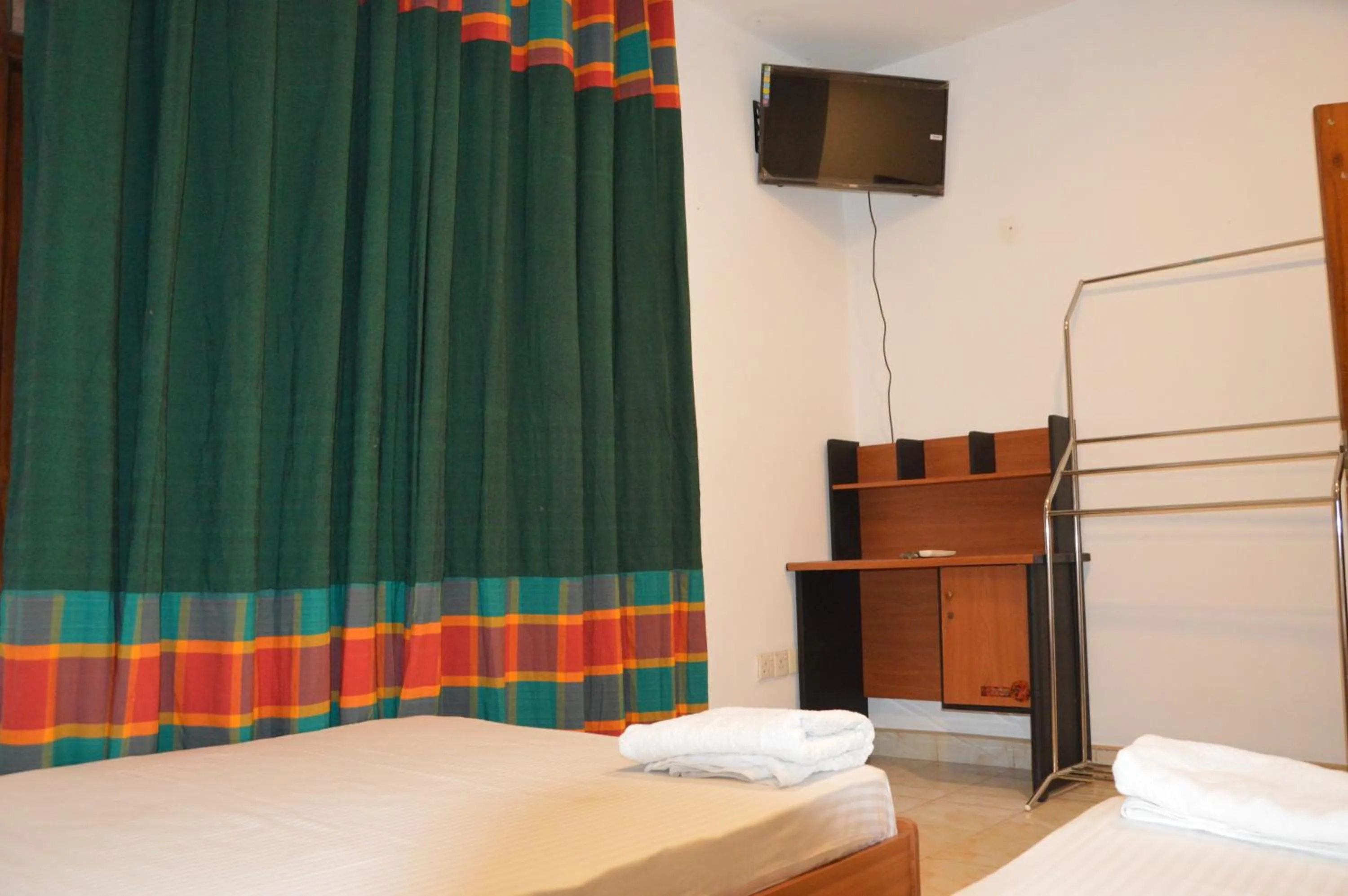 Bed in Cinnamon Airport Residencies