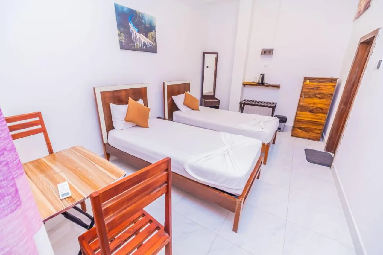 Bed in Cinnamon Airport Residencies