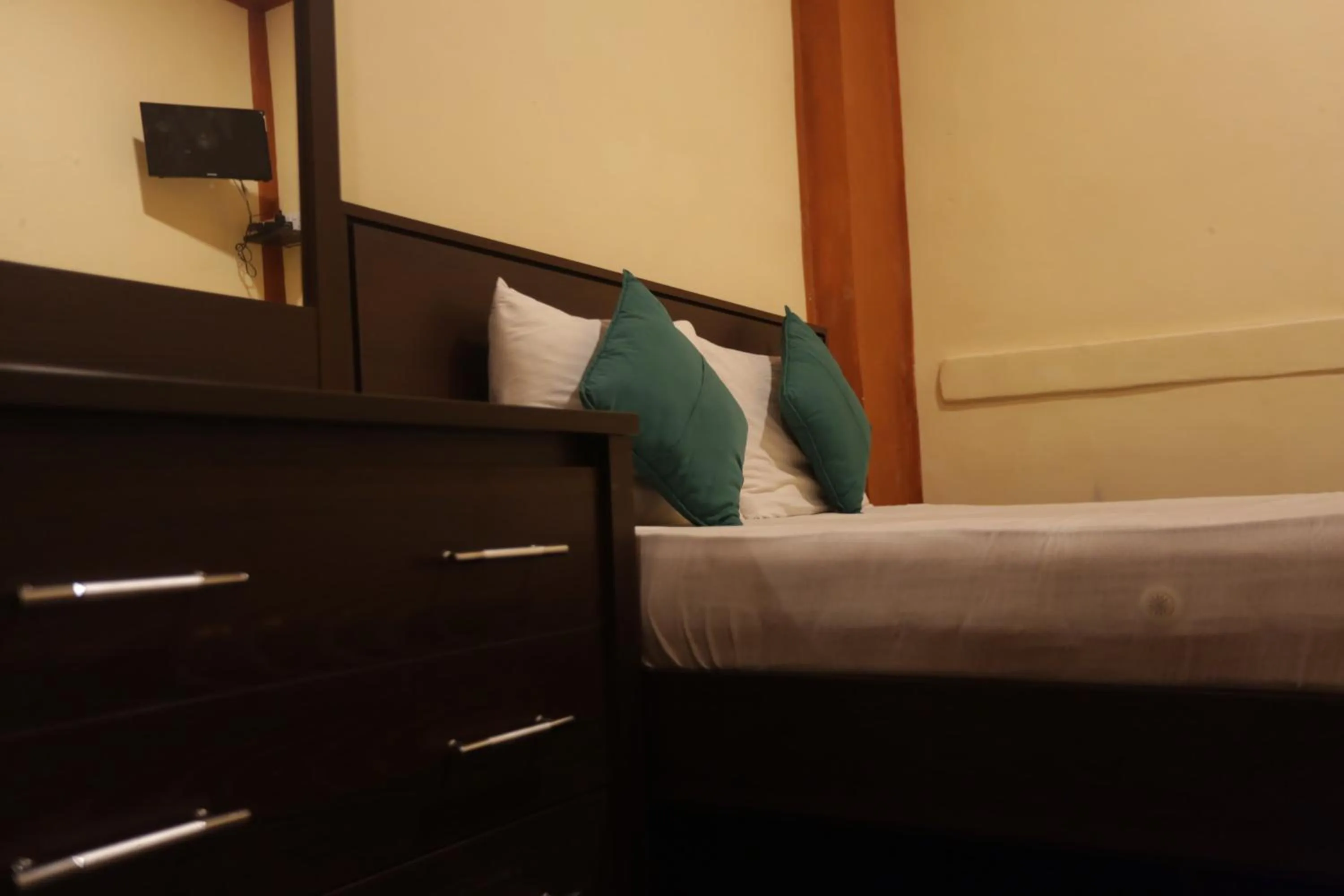 Bed in Cinnamon Airport Residencies