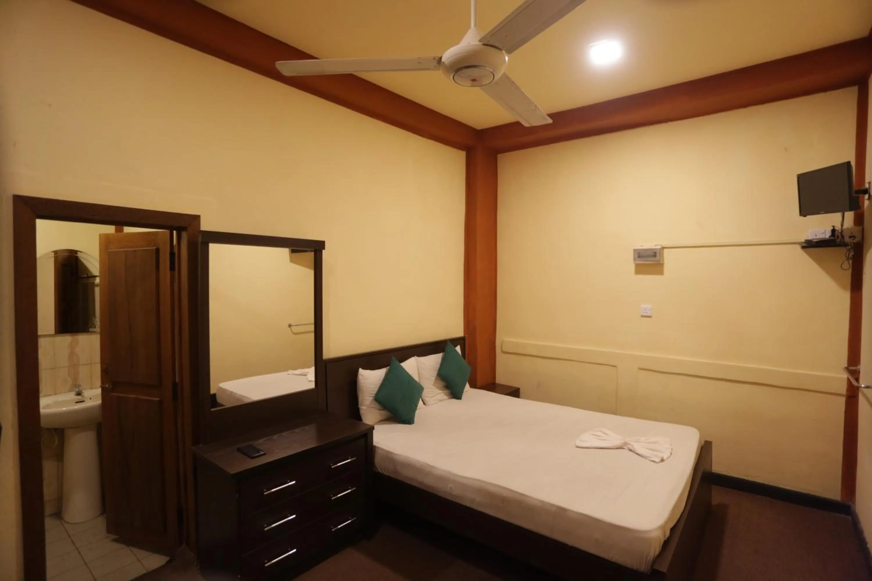 Bed in Cinnamon Airport Residencies