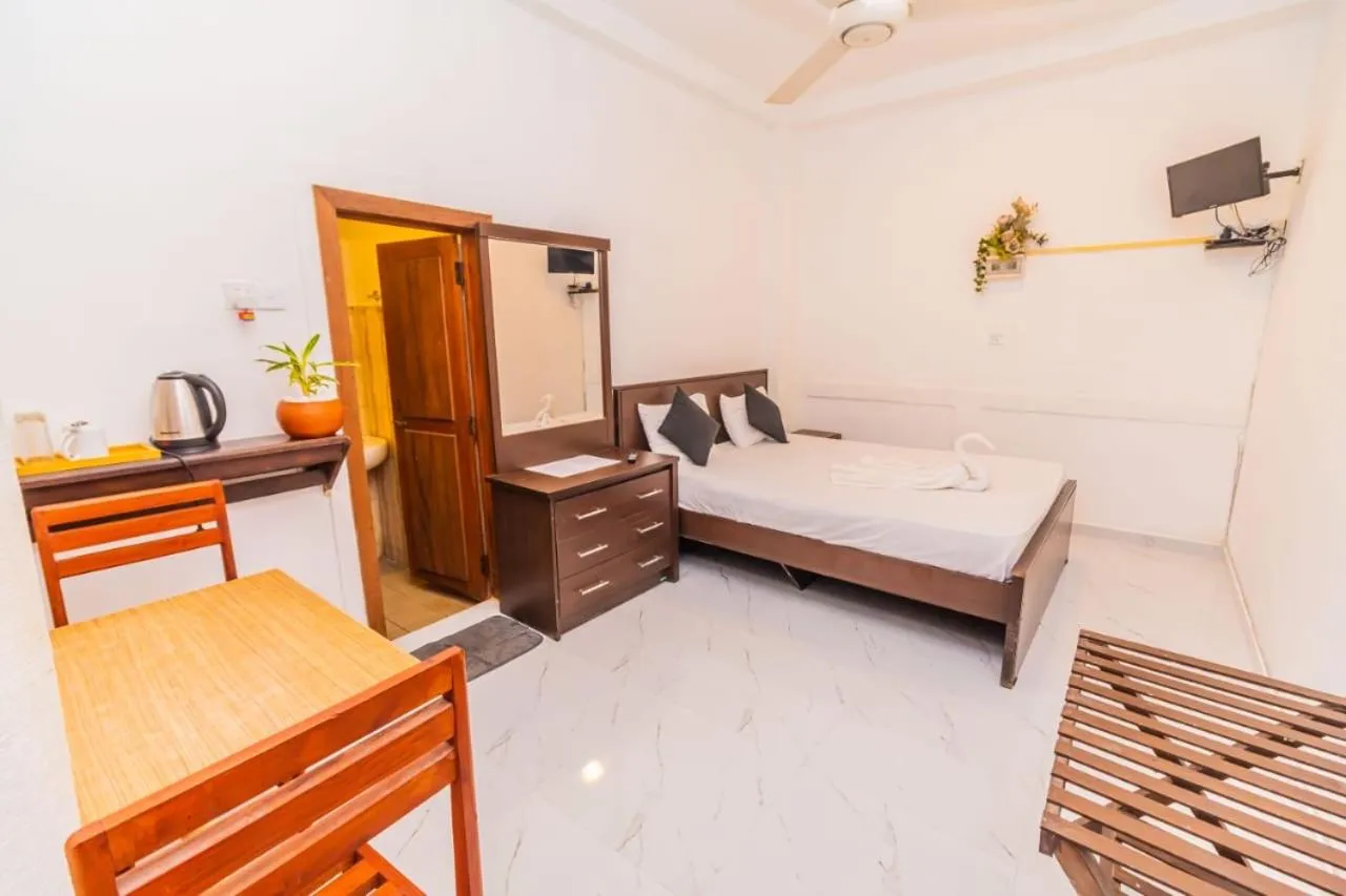 Bed in Cinnamon Airport Residencies