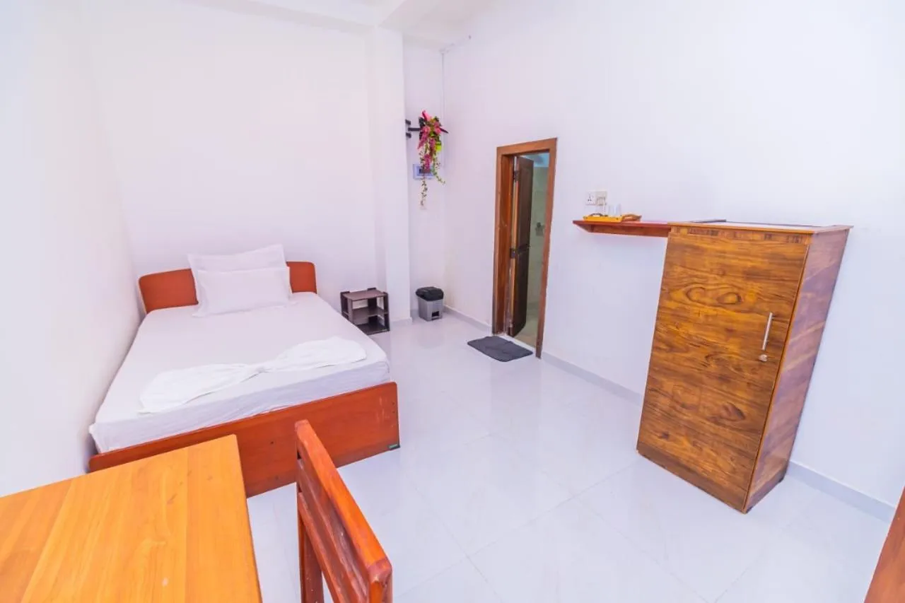 Bed in Cinnamon Airport Residencies