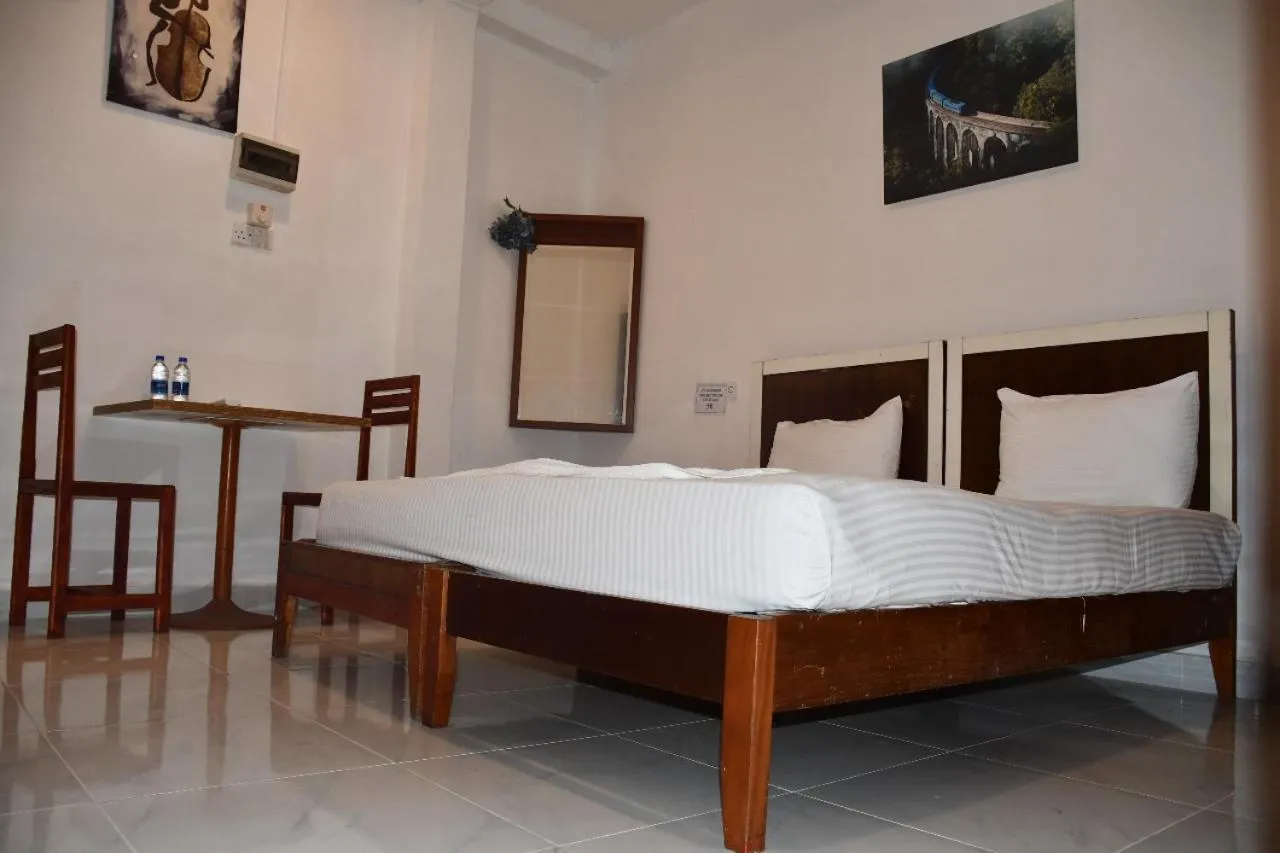 Bed in Cinnamon Airport Residencies