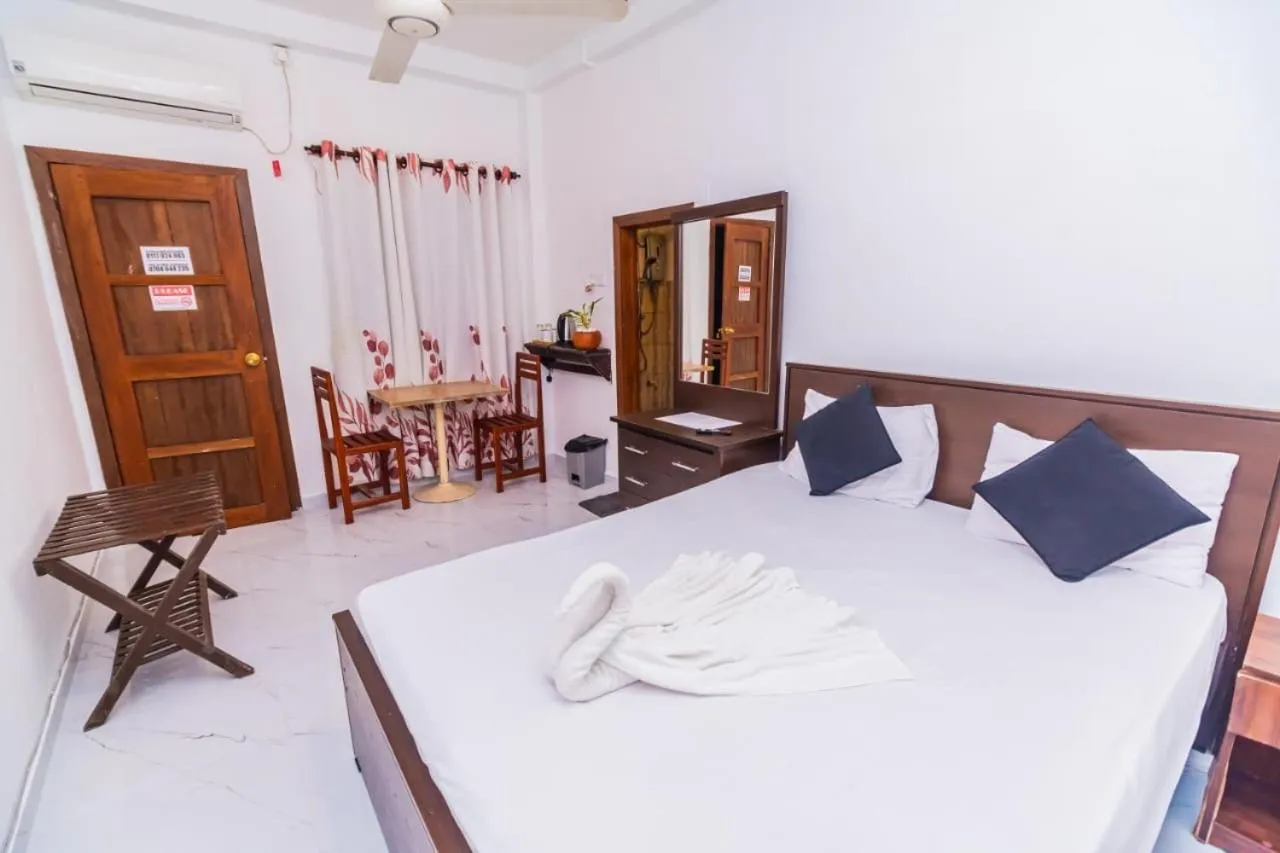 Bed in Cinnamon Airport Residencies