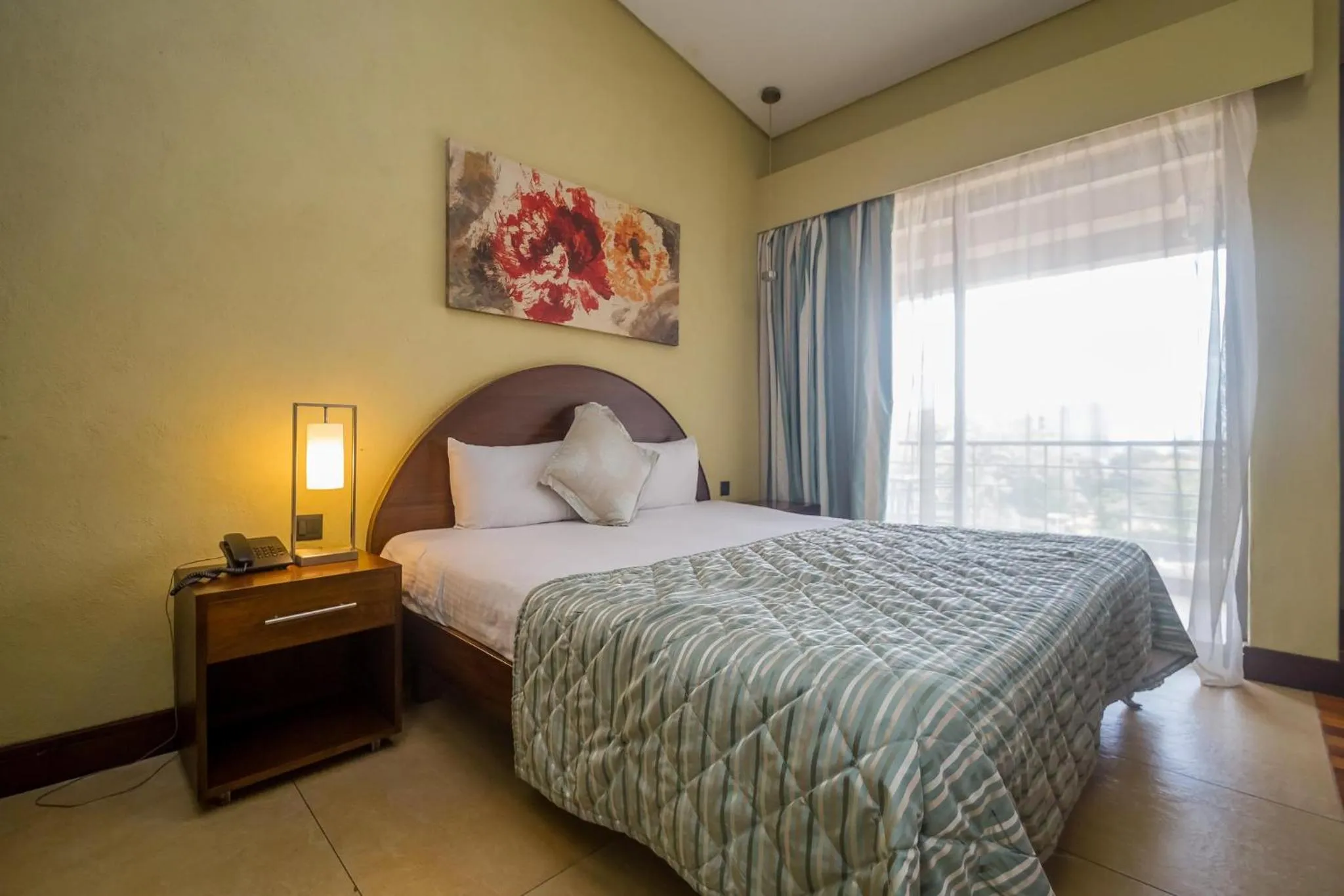 Photo of the whole room, Bed in Taarifa Suites by Dunhill Serviced Apartments