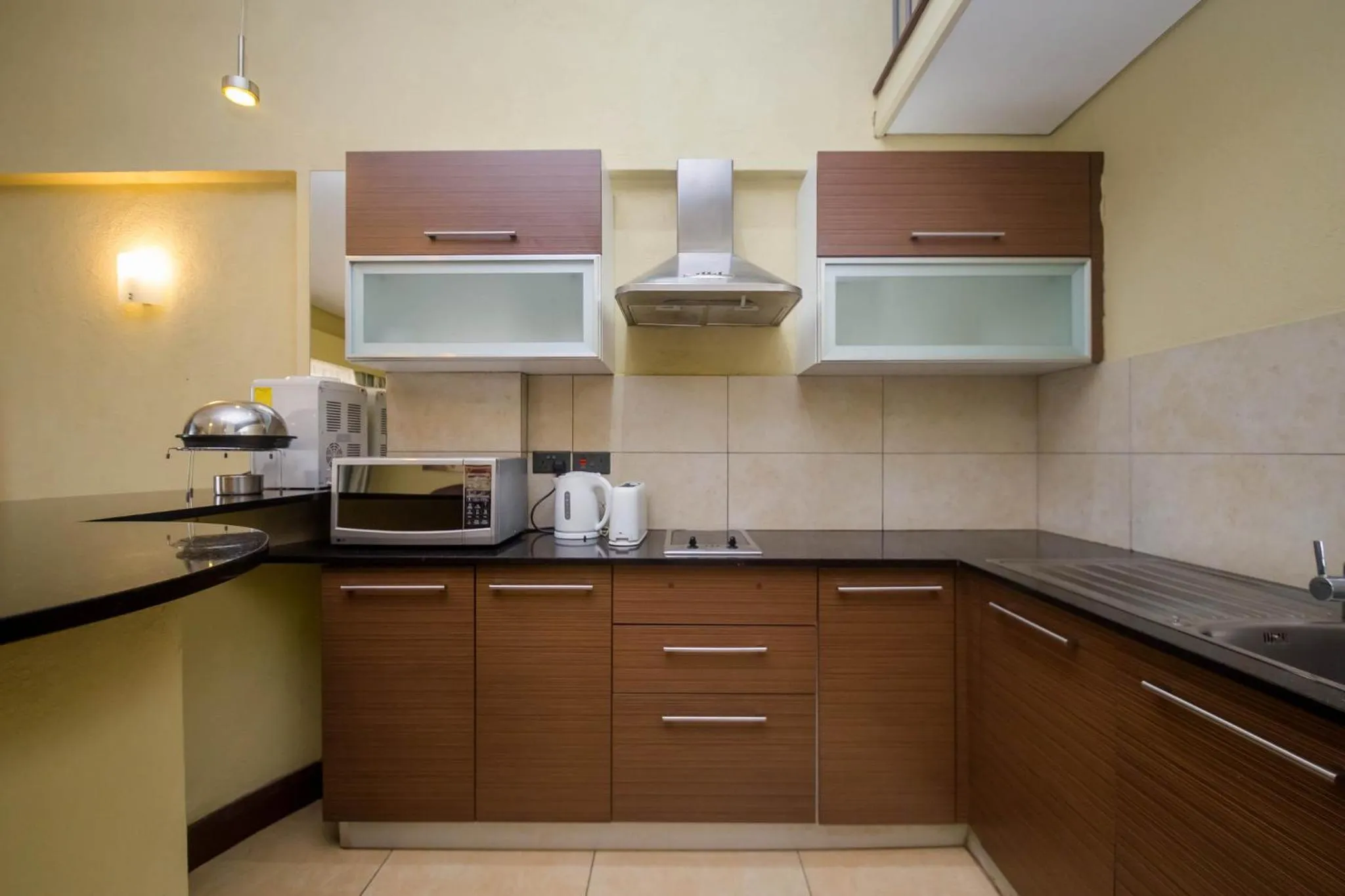 Kitchen or kitchenette in Taarifa Suites by Dunhill Serviced Apartments