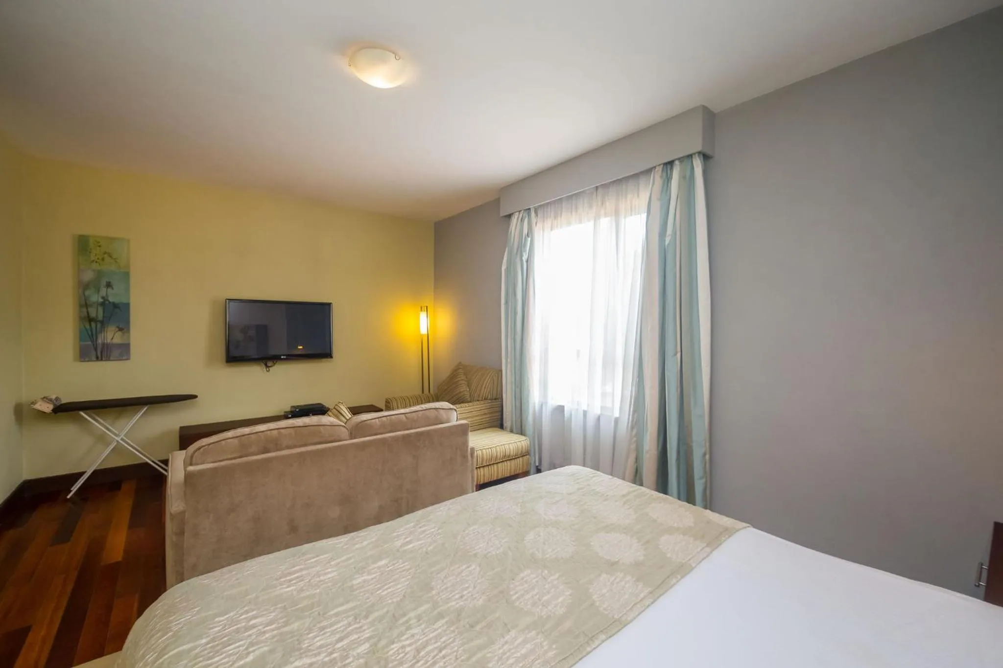 Photo of the whole room, Bed in Taarifa Suites by Dunhill Serviced Apartments