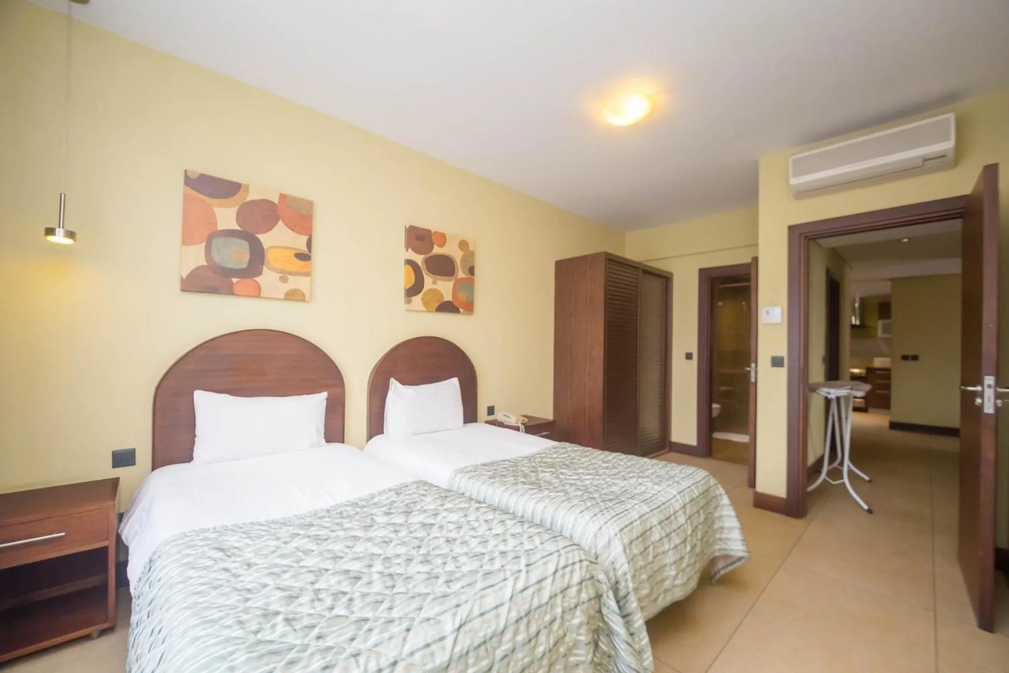 Photo of the whole room, Bed in Taarifa Suites by Dunhill Serviced Apartments