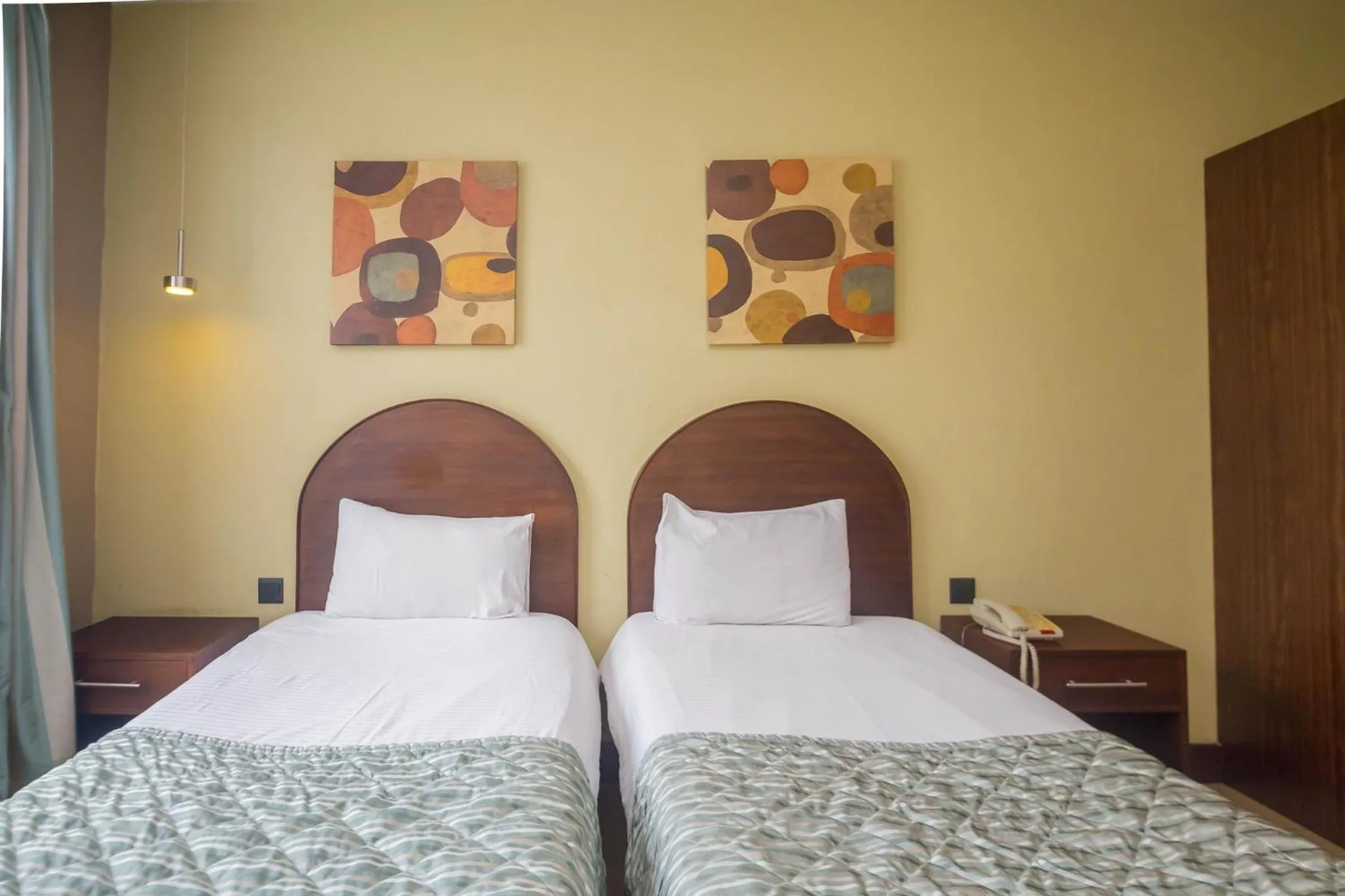 Photo of the whole room, Bed in Taarifa Suites by Dunhill Serviced Apartments