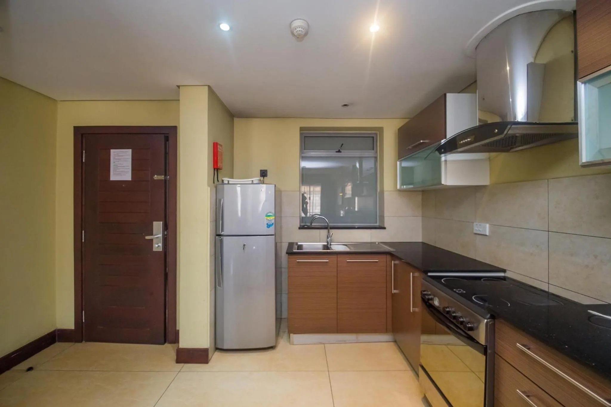 Kitchen or kitchenette in Taarifa Suites by Dunhill Serviced Apartments