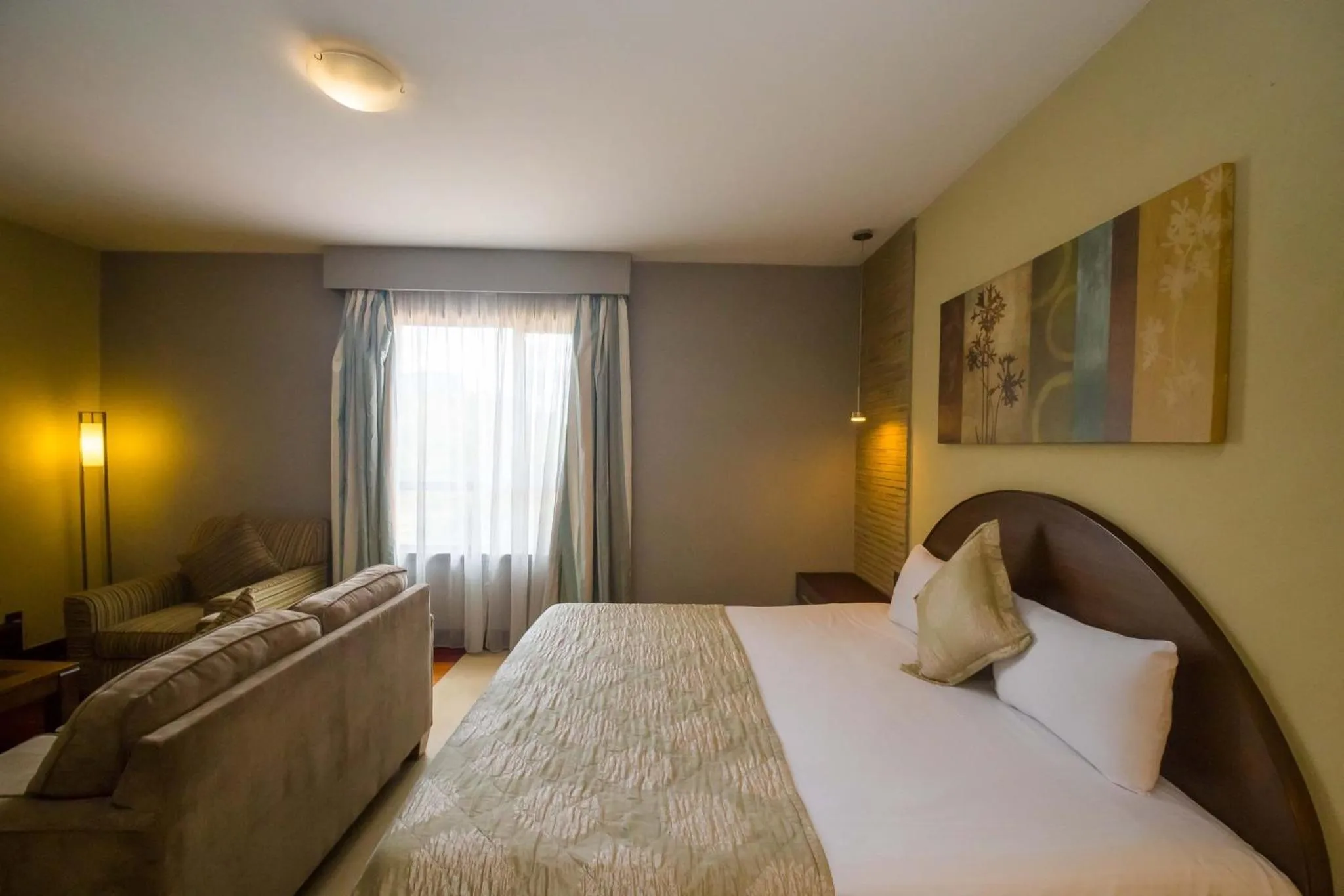 Photo of the whole room, Bed in Taarifa Suites by Dunhill Serviced Apartments