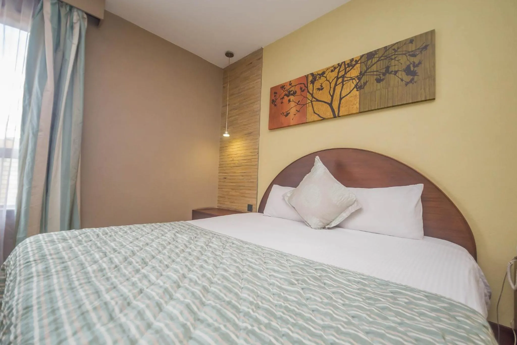 Photo of the whole room, Bed in Taarifa Suites by Dunhill Serviced Apartments