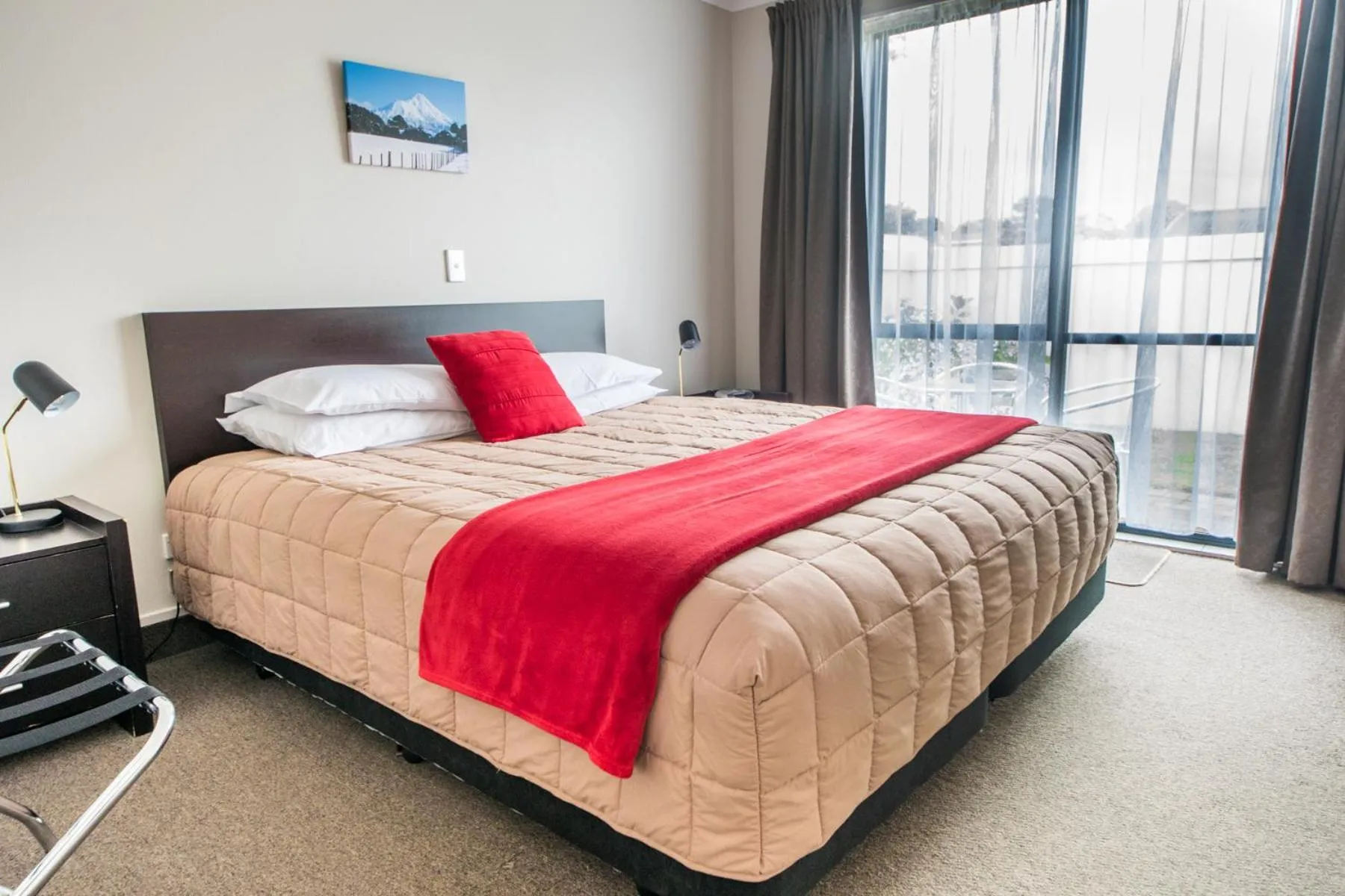 Bed in Bay Palm Motel