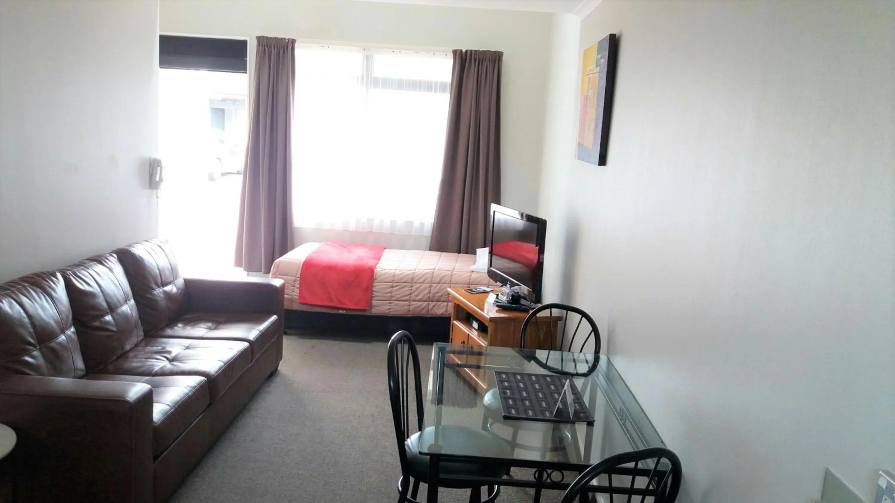 Bed in Bay Palm Motel