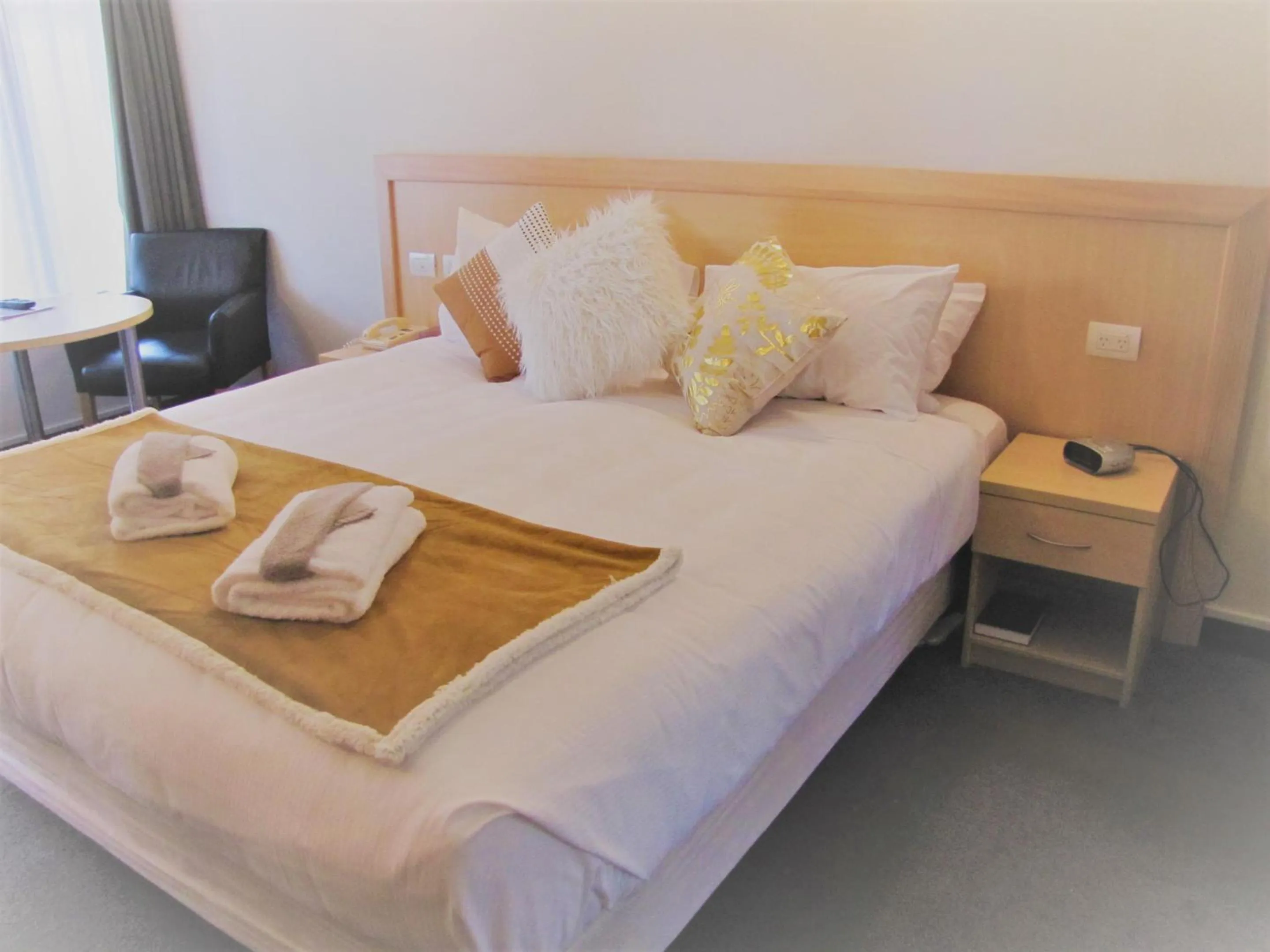 Bed in The Beachcomber Hotel