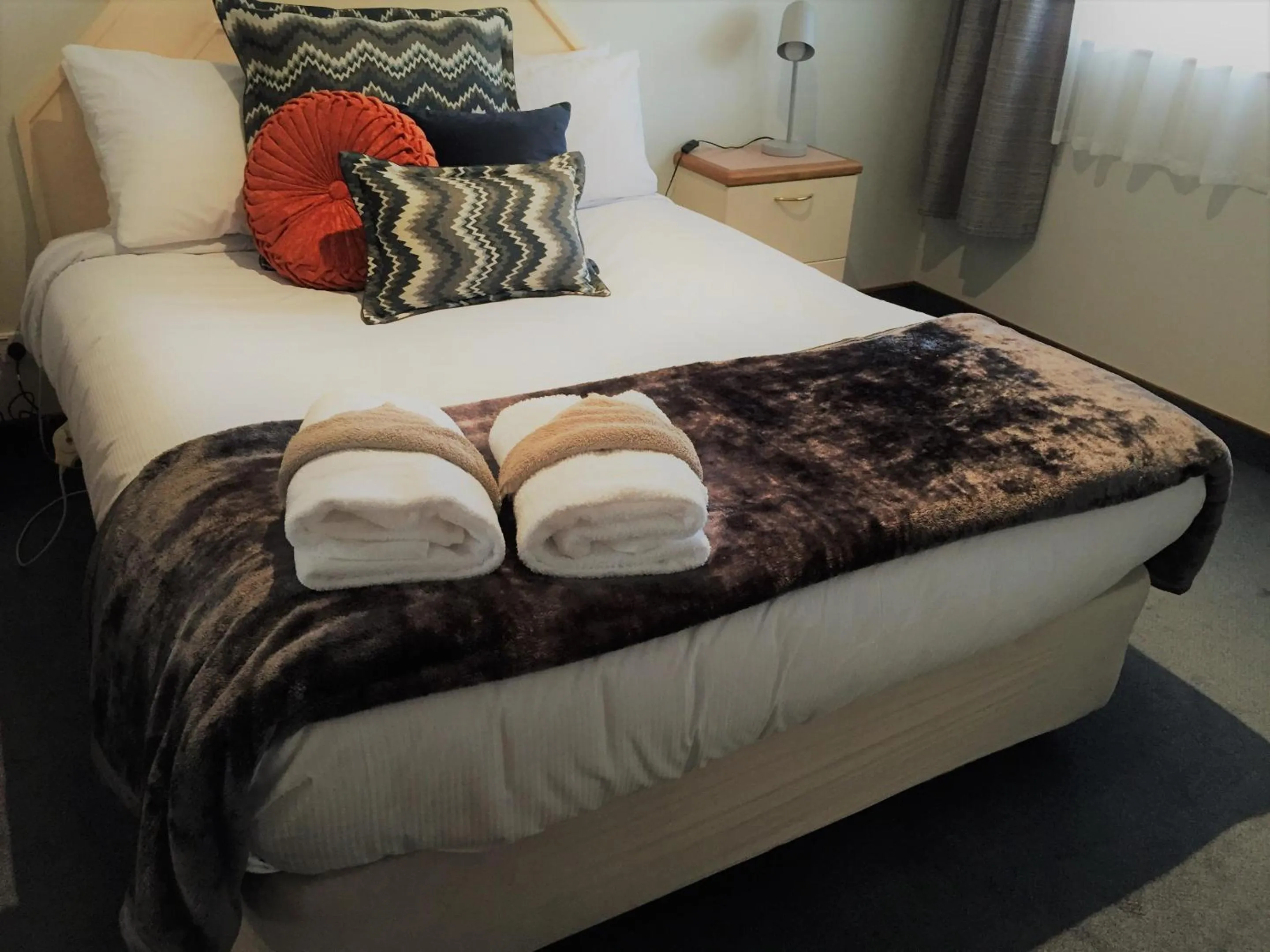 Bed in The Beachcomber Hotel