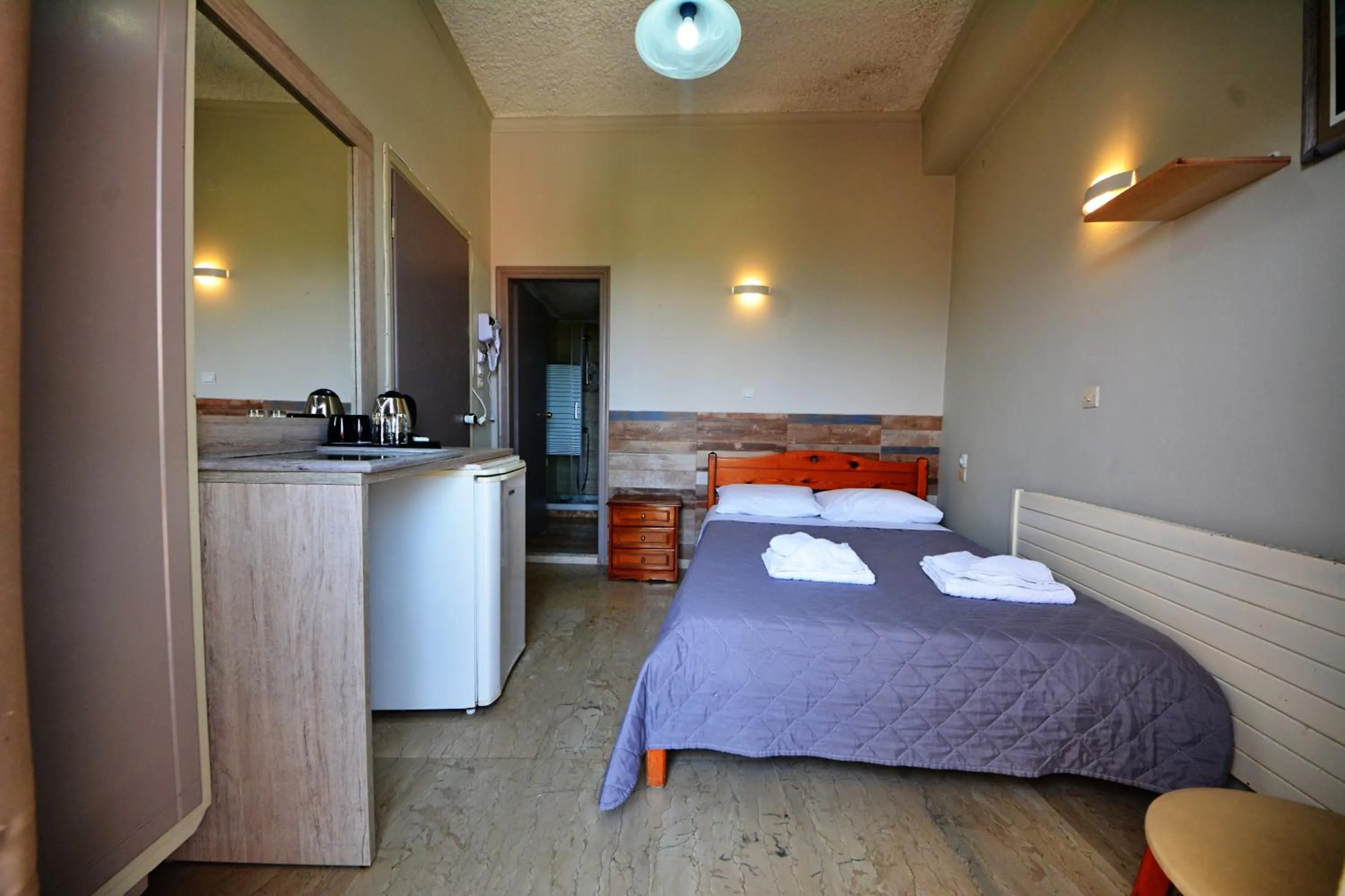 Bed in Bikakis Family Apartments