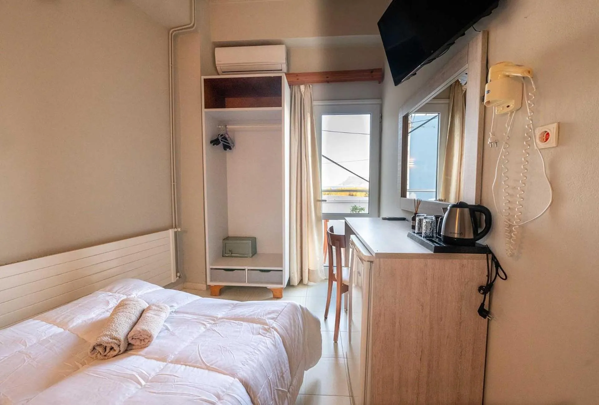 Bed in Bikakis Family Apartments