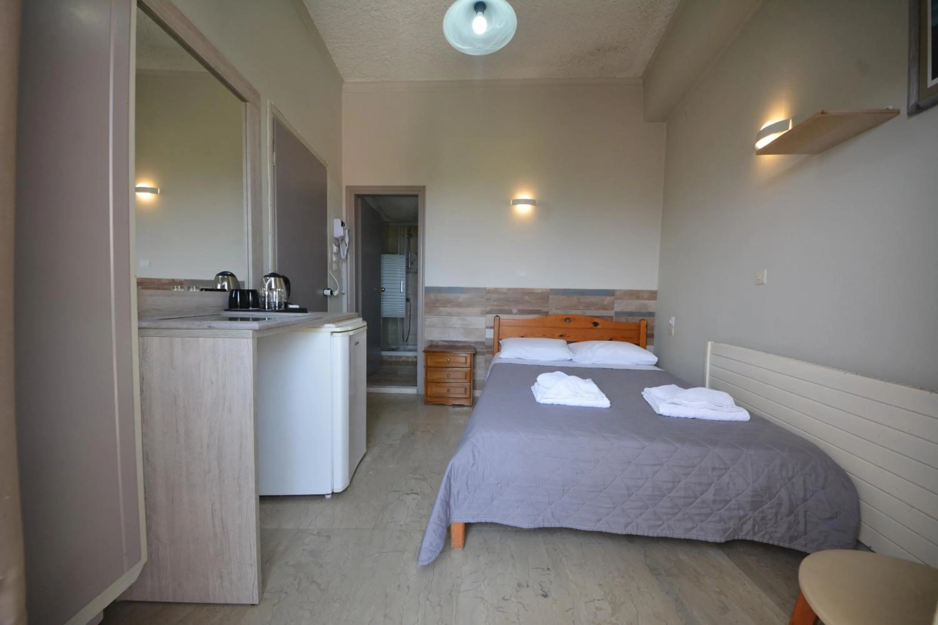 Bed in Bikakis Family Apartments