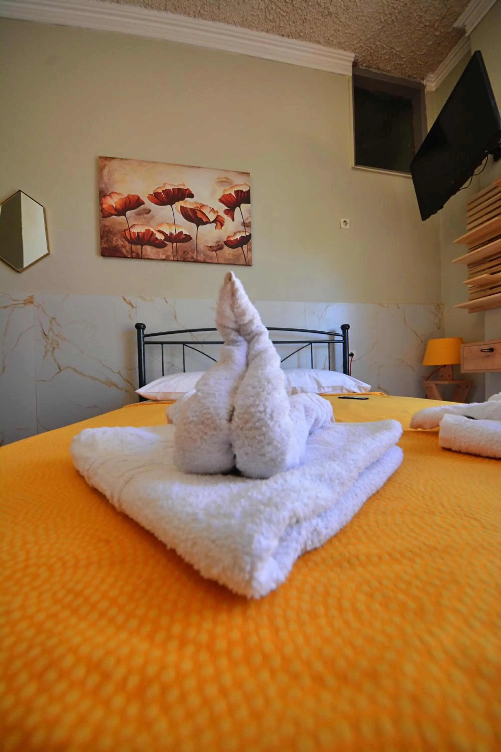 Bed in Bikakis Family Apartments