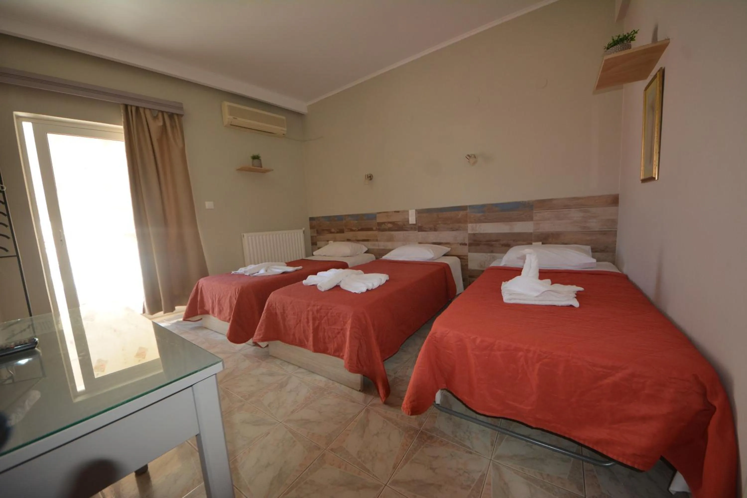 Bed in Bikakis Family Apartments