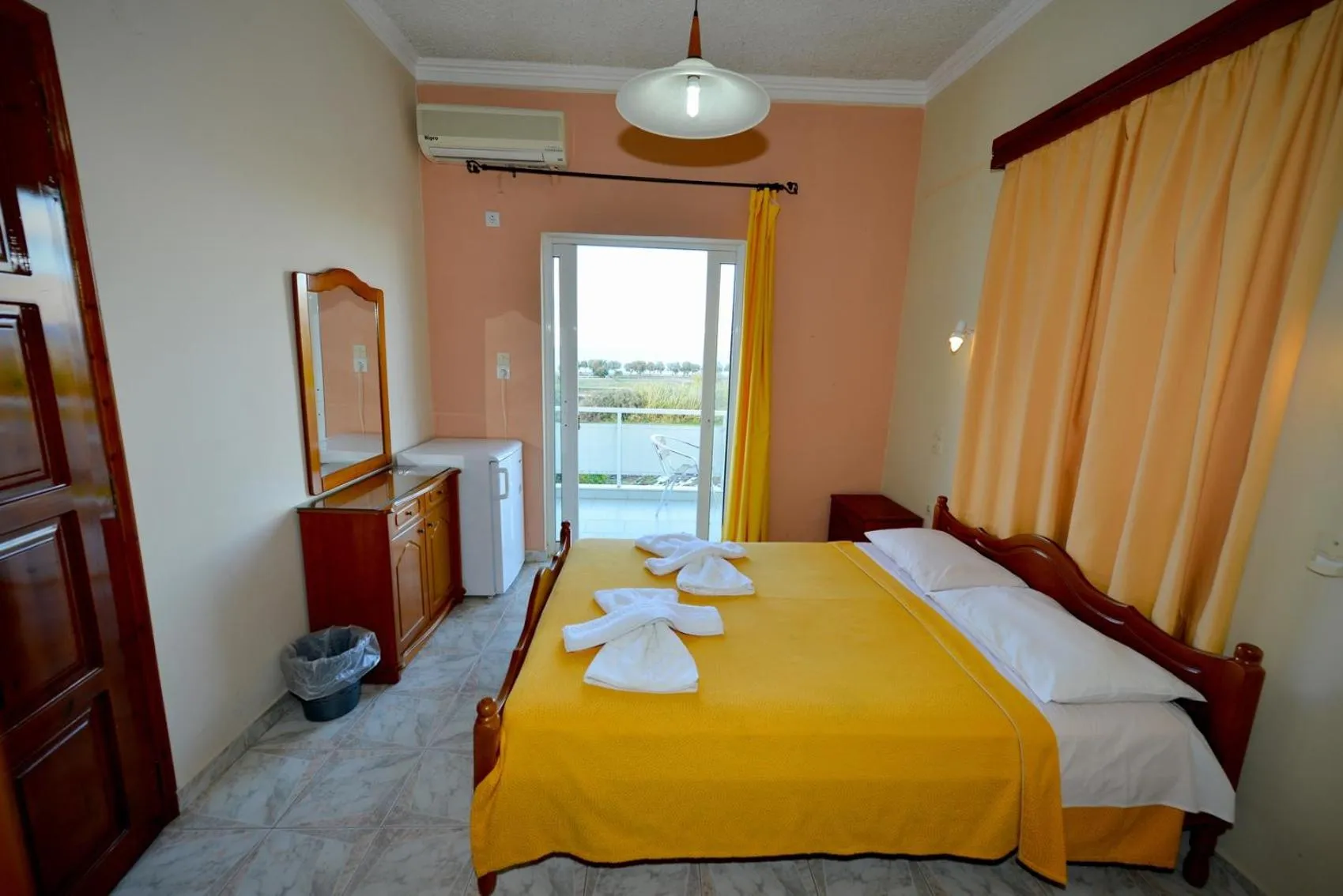 Bed in Bikakis Family Apartments