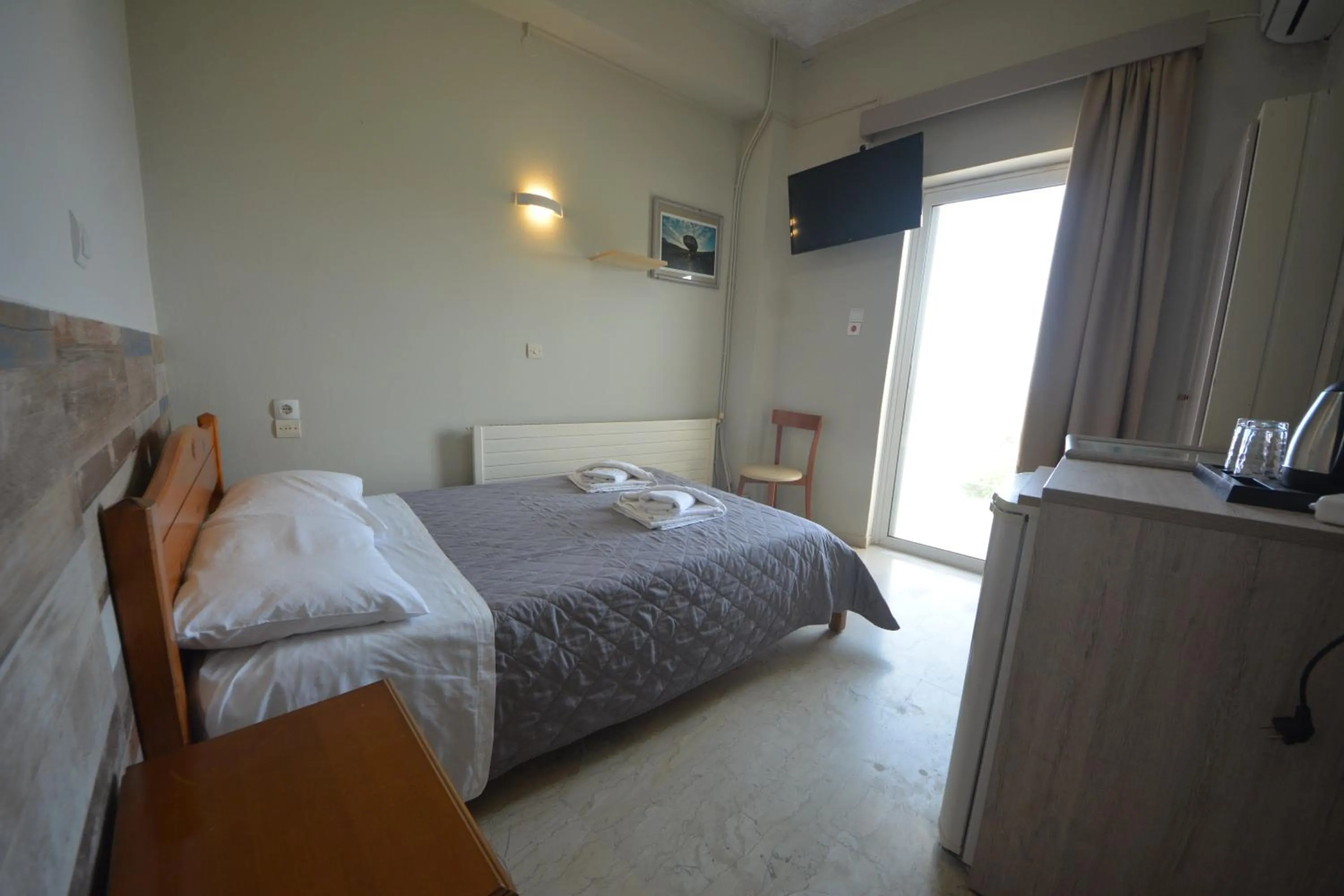 Bed in Bikakis Family Apartments