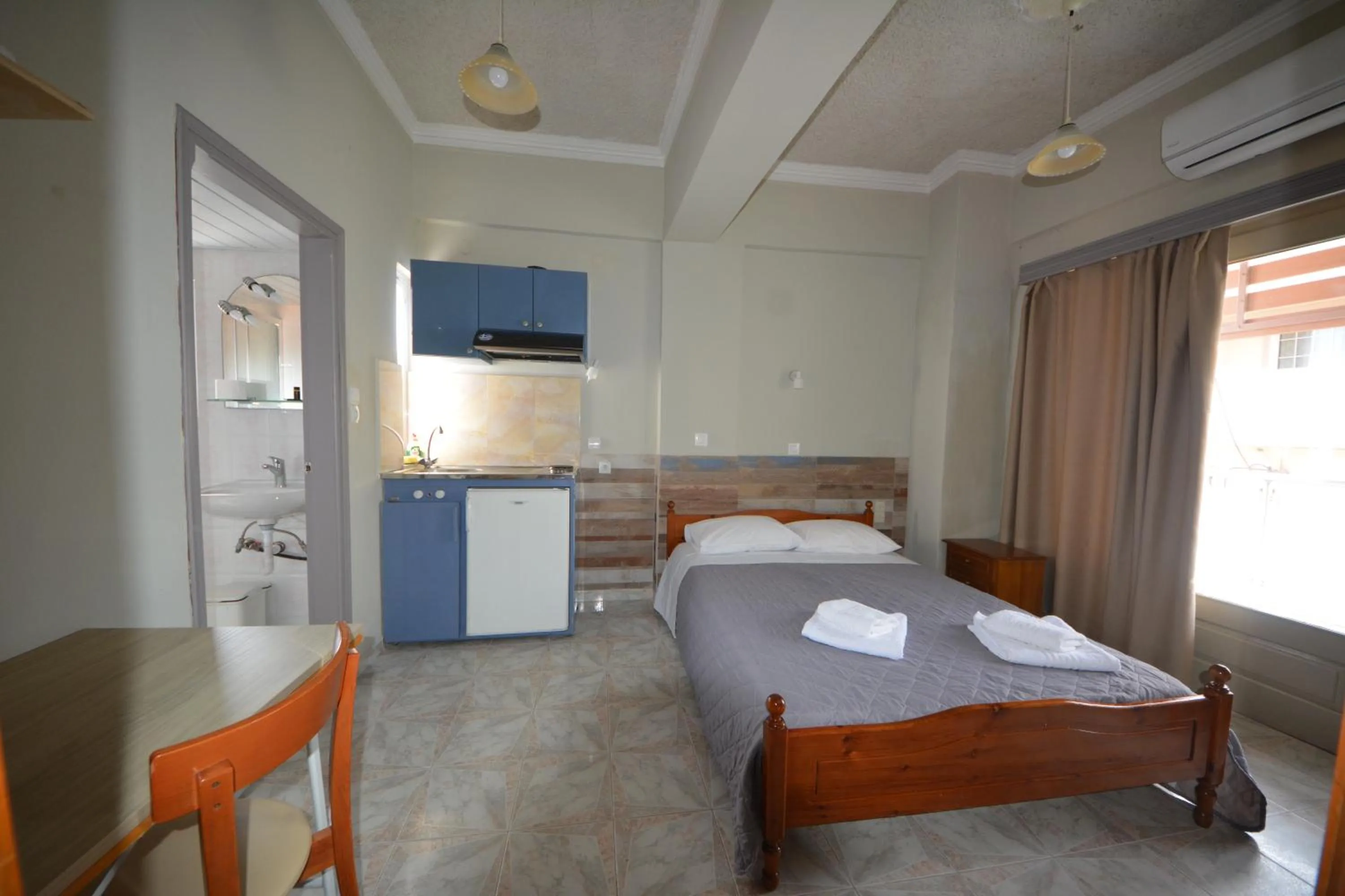 Bed in Bikakis Family Apartments